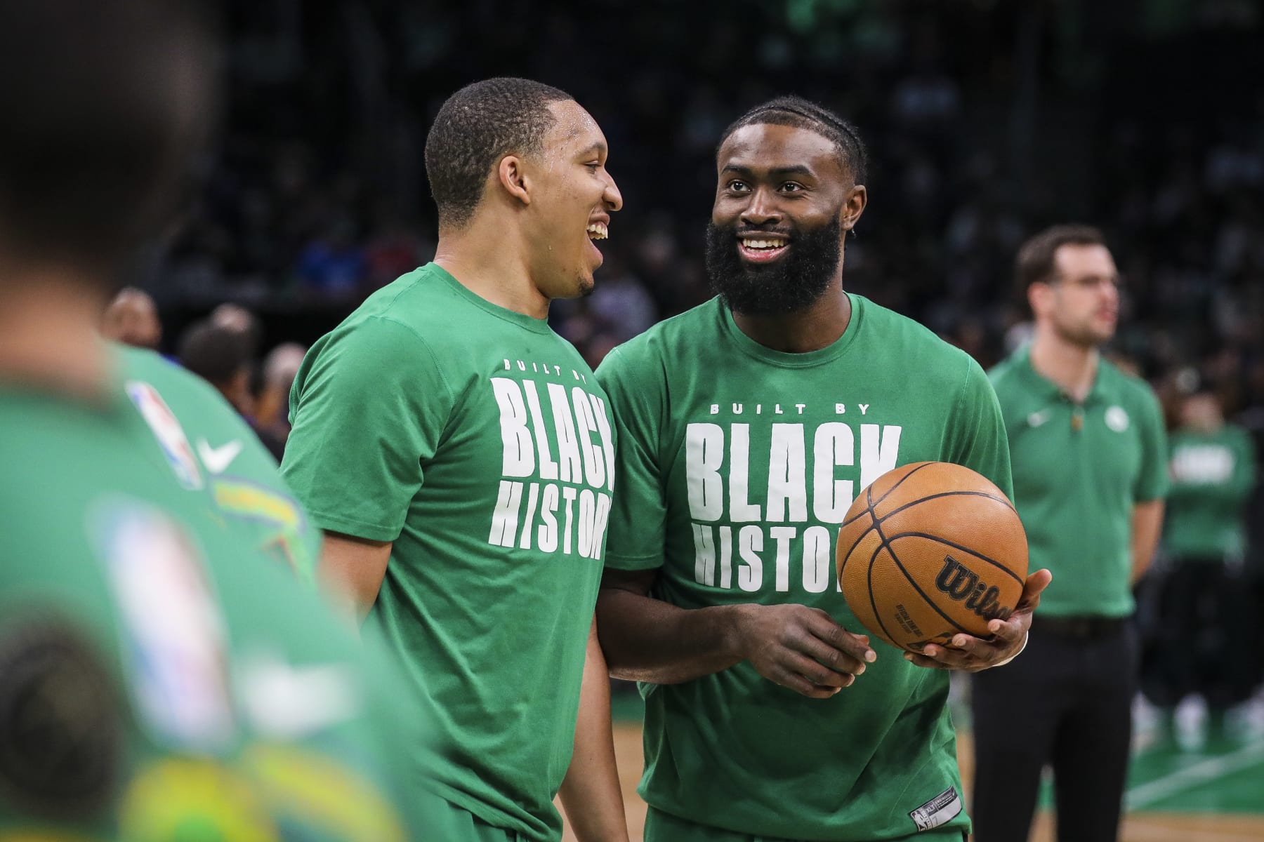 Boston, MA - February 8: Boston Celtics Jaylen Brown and Grant Williams enjoy a pre-game laugh. The Celtics beat the Philadelphia 76ers, 106-99. (Photo by Erin Clark/The Boston Globe via Getty Images)