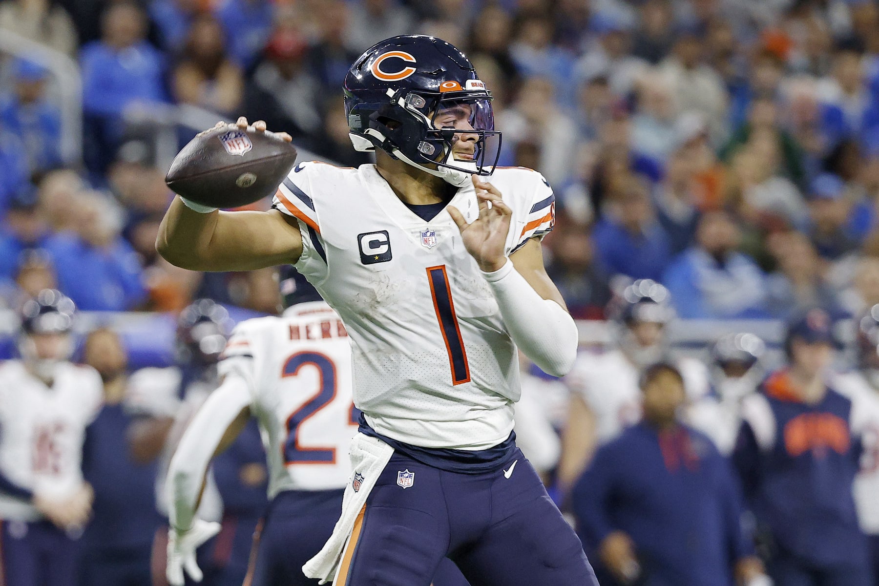 DETROIT, MICHIGAN - JANUARY 01: Justin Fields #1 of the Chicago Bears throws a pass in the second half of a game against the Detroit Lions at Ford Field on January 01, 2023 in Detroit, Michigan. (Photo by Mike Mulholland/Getty Images)