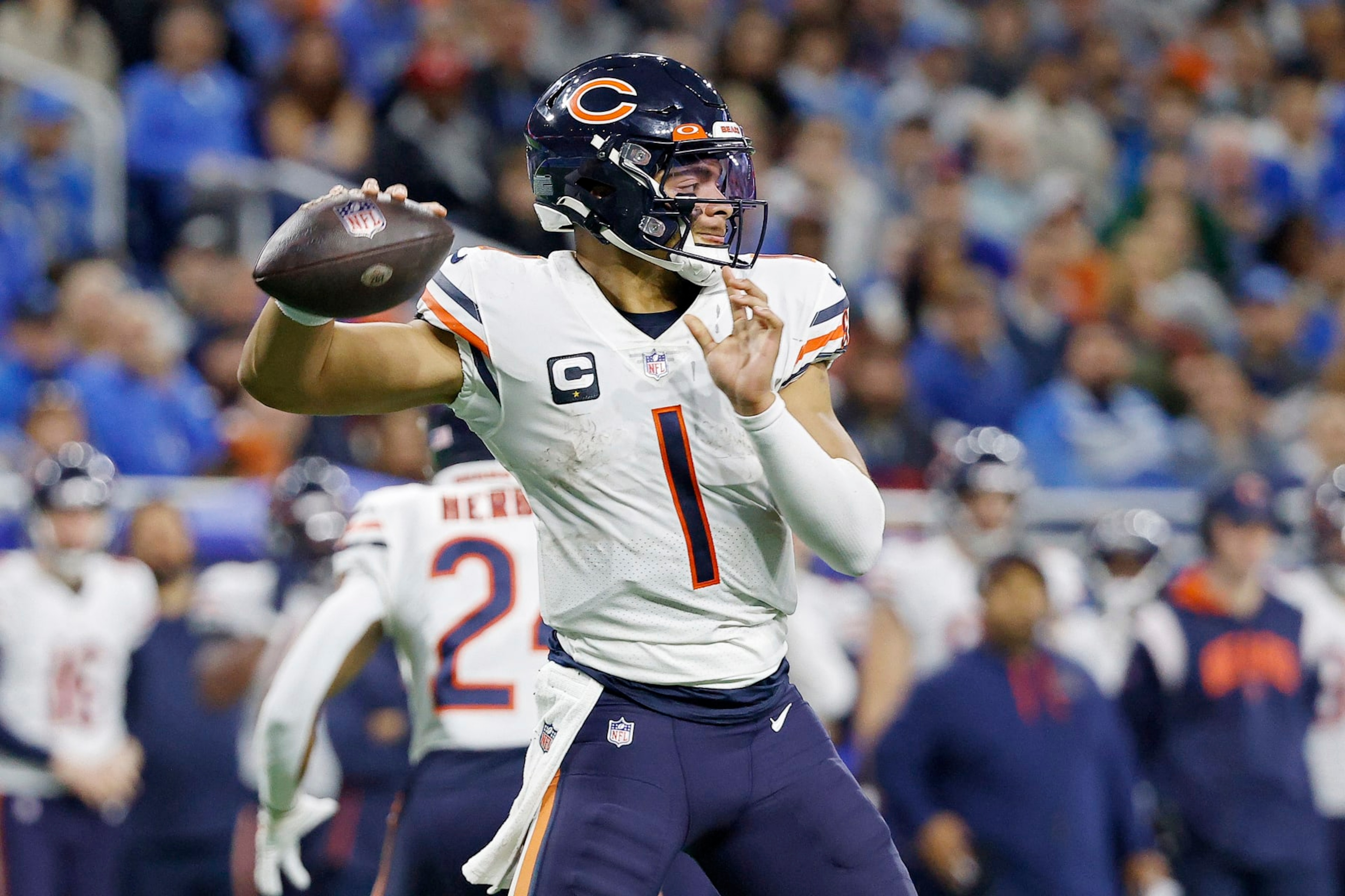 DETROIT, MICHIGAN - JANUARY 01: Justin Fields #1 of the Chicago Bears throws a pass in the second half of a game against the Detroit Lions at Ford Field on January 01, 2023 in Detroit, Michigan. (Photo by Mike Mulholland/Getty Images) DETROIT, MICHIGAN - JANUARY 01: Justin Fields #1 of the Chicago Bears throws a pass in the second half of a game against the Detroit Lions at Ford Field on January 01, 2023 in Detroit, Michigan. (Photo by Mike Mulholland/Getty Images)