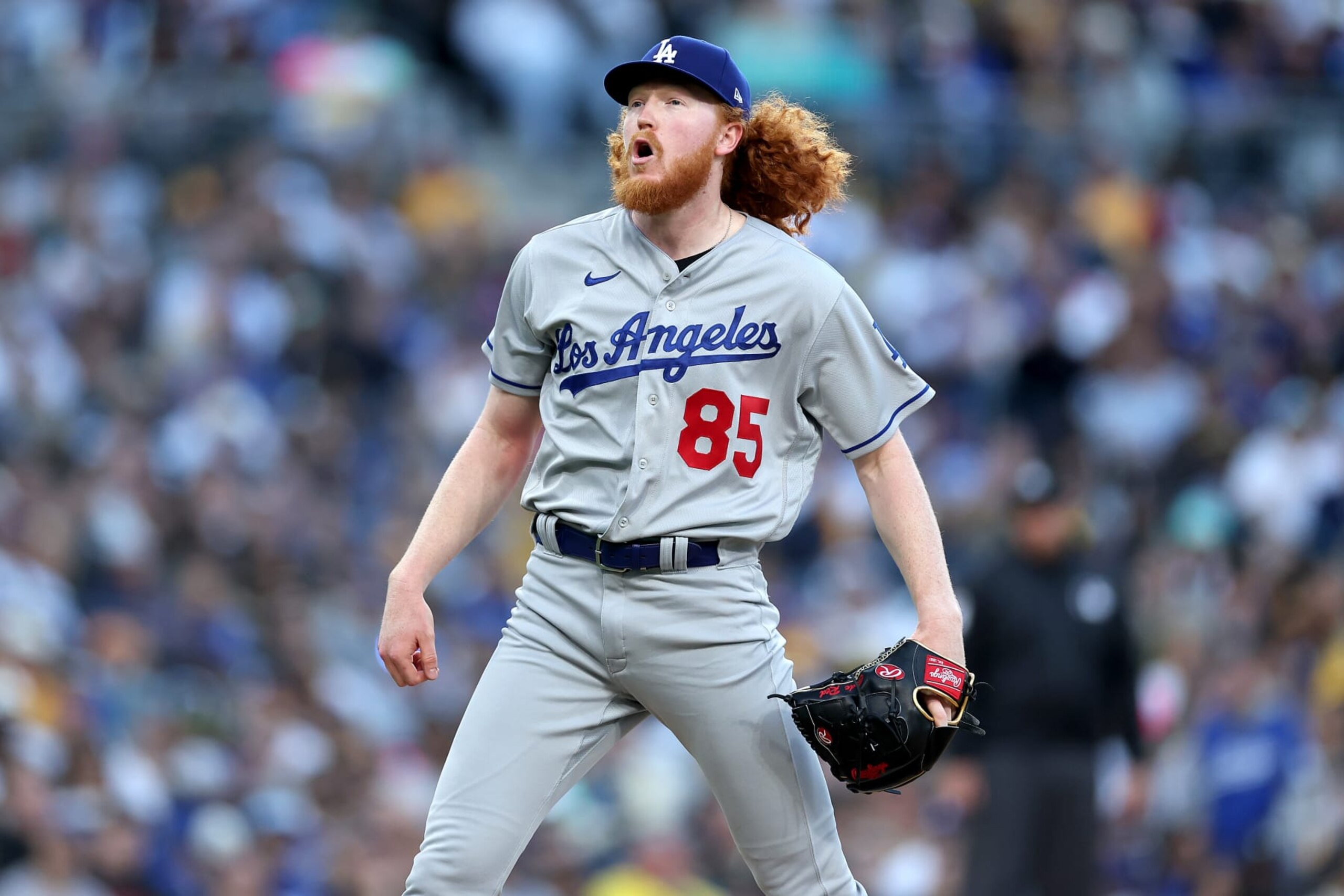 SAN DIEGO, CALIFORNIA - MAY 06: Dustin May #85 of the Los Angeles Dodgers reacts after a pitch during the fifth inning of a game against the San Diego Padres  at PETCO Park on May 06, 2023 in San Diego, California. (Photo by Sean M. Haffey/Getty Images)