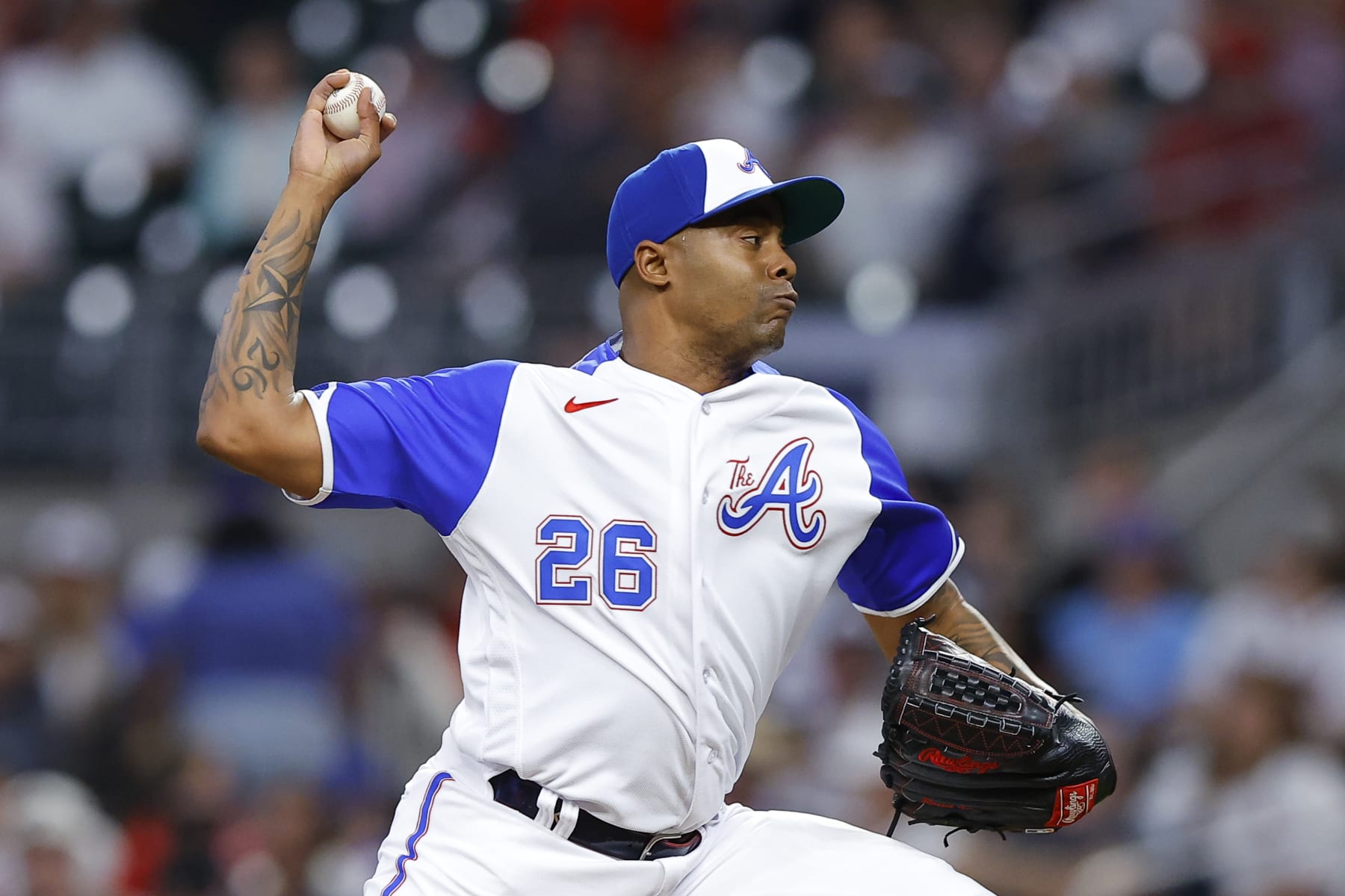 ATLANTA, GA - MAY 06: Raisel Iglesias #26 of the Atlanta Braves pitches during the ninth inning against the Baltimore Orioles at Truist Park on May 6, 2023 in Atlanta, Georgia. (Photo by Todd Kirkland/Getty Images)