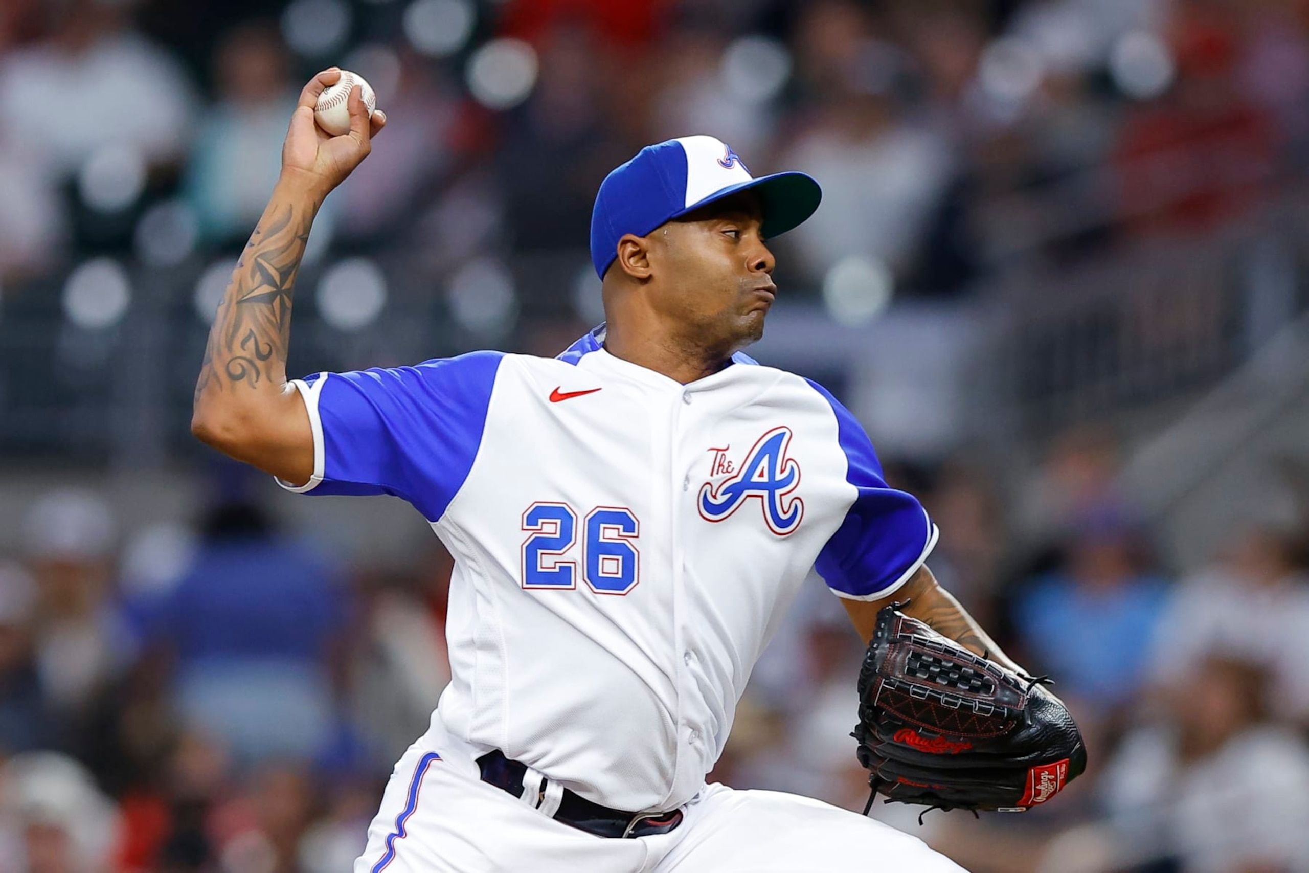 ATLANTA, GA - MAY 06: Raisel Iglesias #26 of the Atlanta Braves pitches during the ninth inning against the Baltimore Orioles at Truist Park on May 6, 2023 in Atlanta, Georgia. (Photo by Todd Kirkland/Getty Images)
