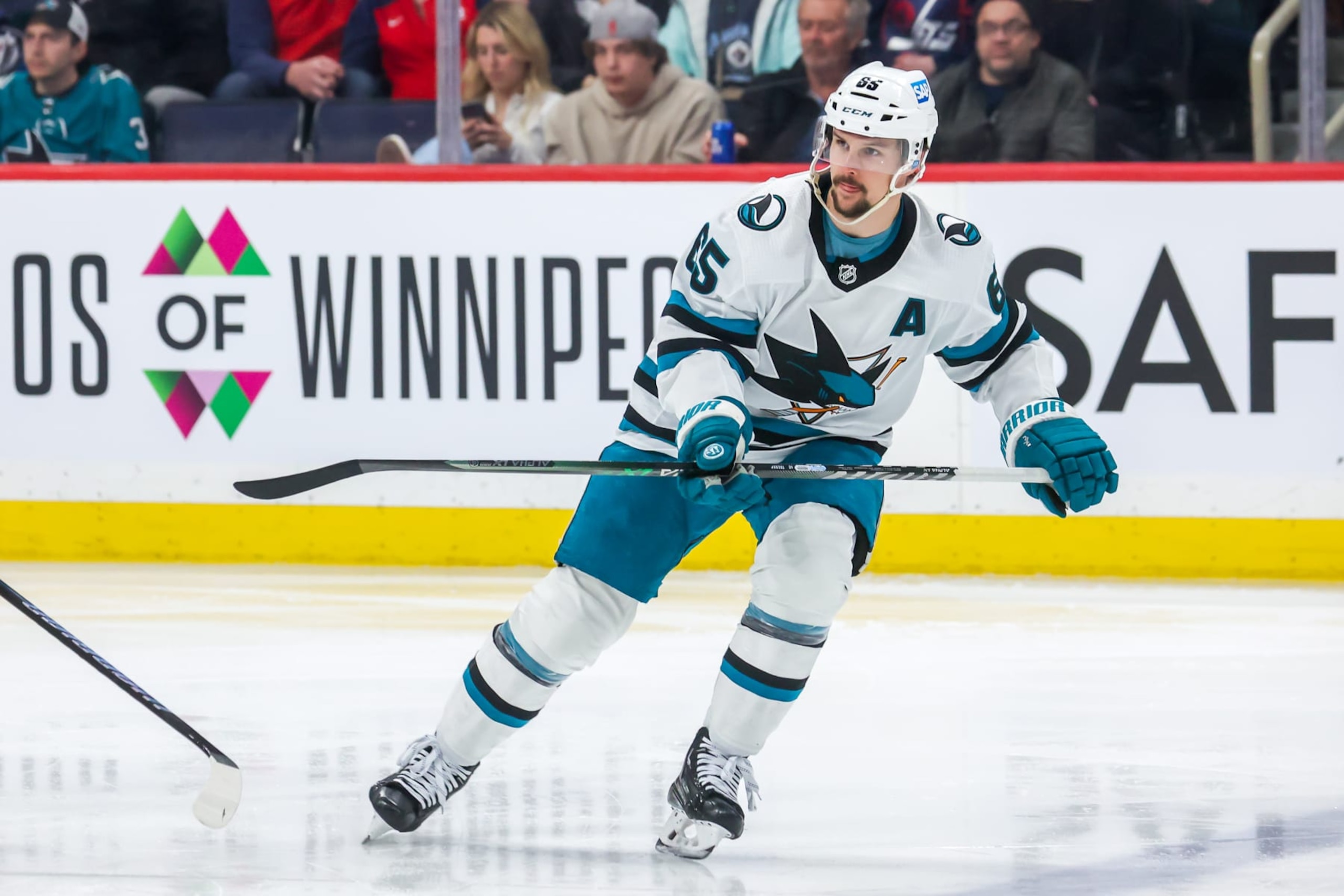 WINNIPEG, CANADA - APRIL 10: Erik Karlsson #65 of the San Jose Sharks skates during third period action against the Winnipeg Jets at Canada Life Centre on April 10, 2023 in Winnipeg, Manitoba, Canada. (Photo by Jonathan Kozub/NHLI via Getty Images)