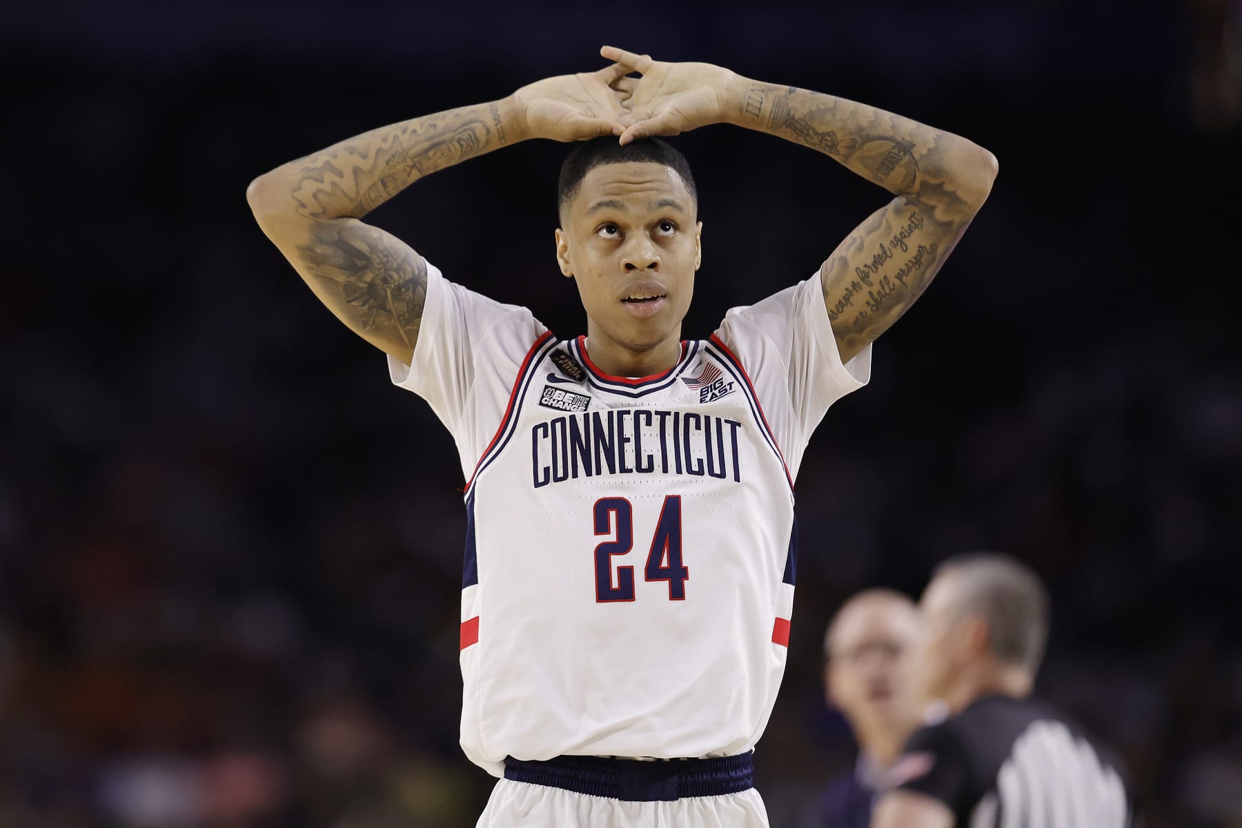 HOUSTON, TEXAS - APRIL 03: Jordan Hawkins #24 of the Connecticut Huskies reacts during the first half against the San Diego State Aztecs during the NCAA Men's Basketball Tournament National Championship game at NRG Stadium on April 03, 2023 in Houston, Texas. (Photo by Carmen Mandato/Getty Images)