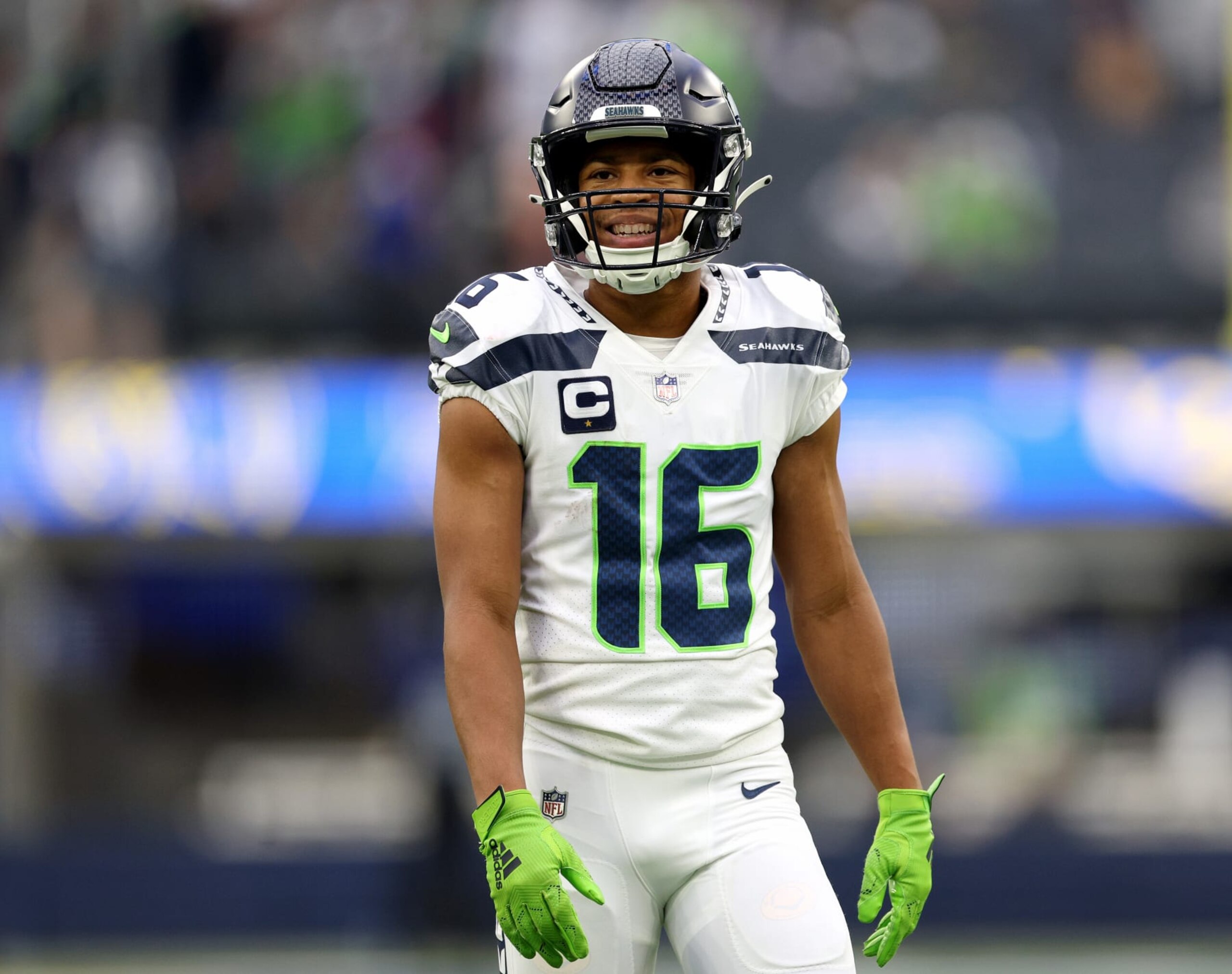 INGLEWOOD, CALIFORNIA - DECEMBER 04: Tyler Lockett #16 of the Seattle Seahawks laughs during warm up before the game against the Los Angeles Rams at SoFi Stadium on December 04, 2022 in Inglewood, California. (Photo by Harry How/Getty Images)