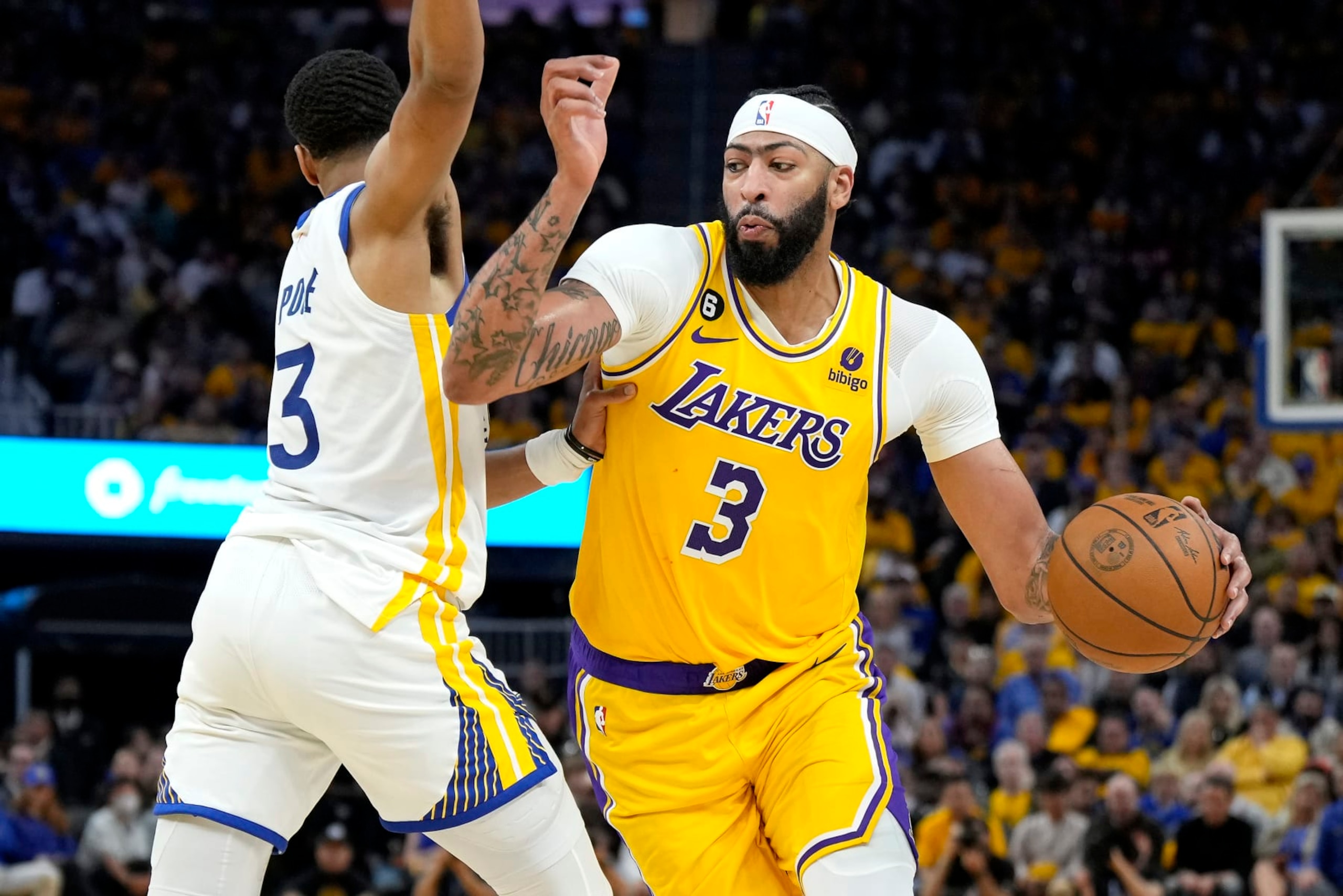 SAN FRANCISCO, CALIFORNIA - MAY 10: Anthony Davis #3 of the Los Angeles Lakers drives past Jordan Poole #3 of the Golden State Warriors during the second quarter in game five of the Western Conference Semifinal Playoffs at Chase Center on May 10, 2023 in San Francisco, California. NOTE TO USER: User expressly acknowledges and agrees that, by downloading and or using this photograph, User is consenting to the terms and conditions of the Getty Images License Agreement. (Photo by Thearon W. Henderson/Getty Images) SAN FRANCISCO, CALIFORNIA - MAY 10: Anthony Davis #3 of the Los Angeles Lakers drives past Jordan Poole #3 of the Golden State Warriors during the second quarter in game five of the Western Conference Semifinal Playoffs at Chase Center on May 10, 2023 in San Francisco, California. NOTE TO USER: User expressly acknowledges and agrees that, by downloading and or using this photograph, User is consenting to the terms and conditions of the Getty Images License Agreement. (Photo by Thearon W. Henderson/Getty Images)