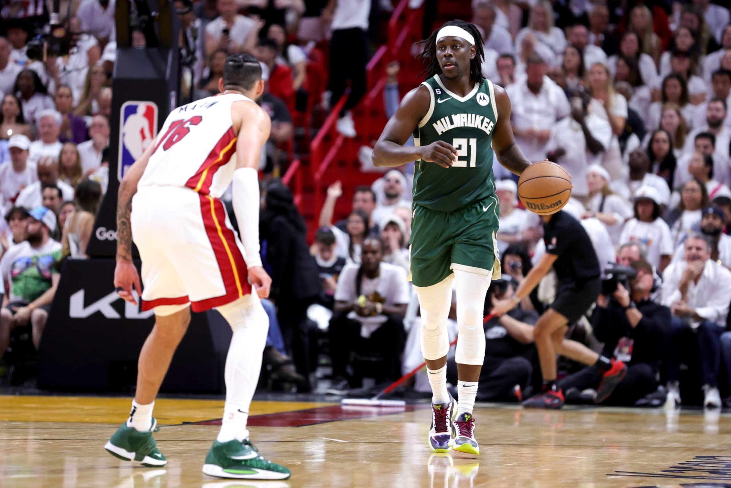MIAMI, FLORIDA - APRIL 24: Jrue Holiday #21 of the Milwaukee Bucks dribbles the ball against the Miami Heat during the fourth quarter in Game Four of the Eastern Conference First Round Playoffs at Kaseya Center on April 24, 2023 in Miami, Florida. NOTE TO USER: User expressly acknowledges and agrees that, by downloading and or using this photograph, User is consenting to the terms and conditions of the Getty Images License Agreement. (Photo by Megan Briggs/Getty Images) MIAMI, FLORIDA - APRIL 24: Jrue Holiday #21 of the Milwaukee Bucks dribbles the ball against the Miami Heat during the fourth quarter in Game Four of the Eastern Conference First Round Playoffs at Kaseya Center on April 24, 2023 in Miami, Florida. NOTE TO USER: User expressly acknowledges and agrees that, by downloading and or using this photograph, User is consenting to the terms and conditions of the Getty Images License Agreement. (Photo by Megan Briggs/Getty Images)