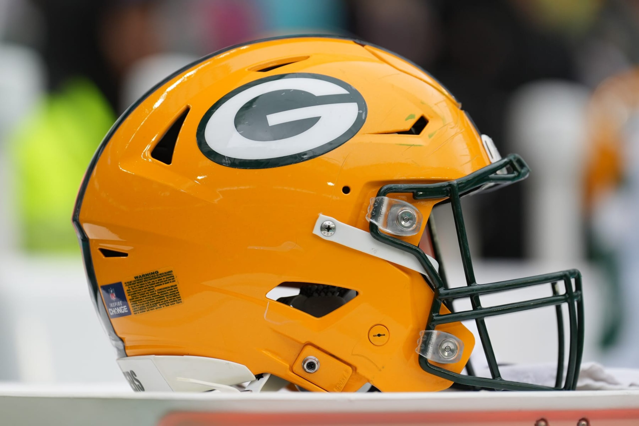 MIAMI GARDENS, FL - DECEMBER 25: a Green Bay Packers helmet rests near the sidelines during the game between the Green Bay Packers and the Miami Dolphins on Sunday, December 25, 2022 at Hard Rock Stadium, Miami Gardens, Fla. (Photo by Peter Joneleit/Icon Sportswire via Getty Images)