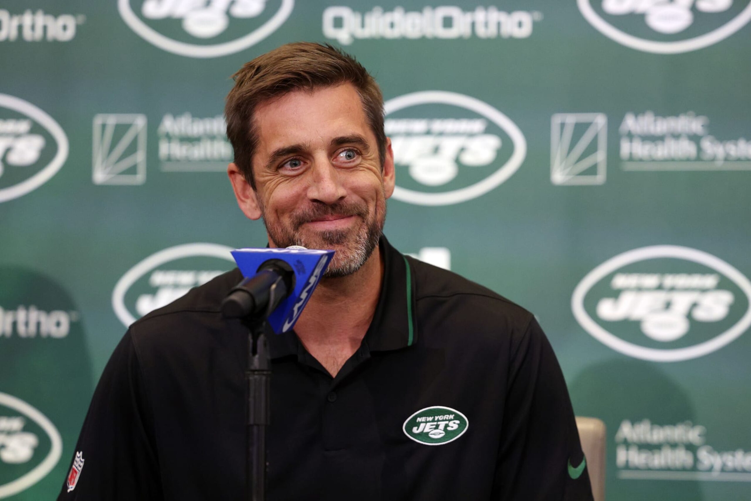 FLORHAM PARK, NEW JERSEY - APRIL 26: New York Jets quarterback Aaron Rodgers attends an introductory press conference at Atlantic Health Jets Training Center on April 26, 2023 in Florham Park, New Jersey. (Photo by Elsa/Getty Images)