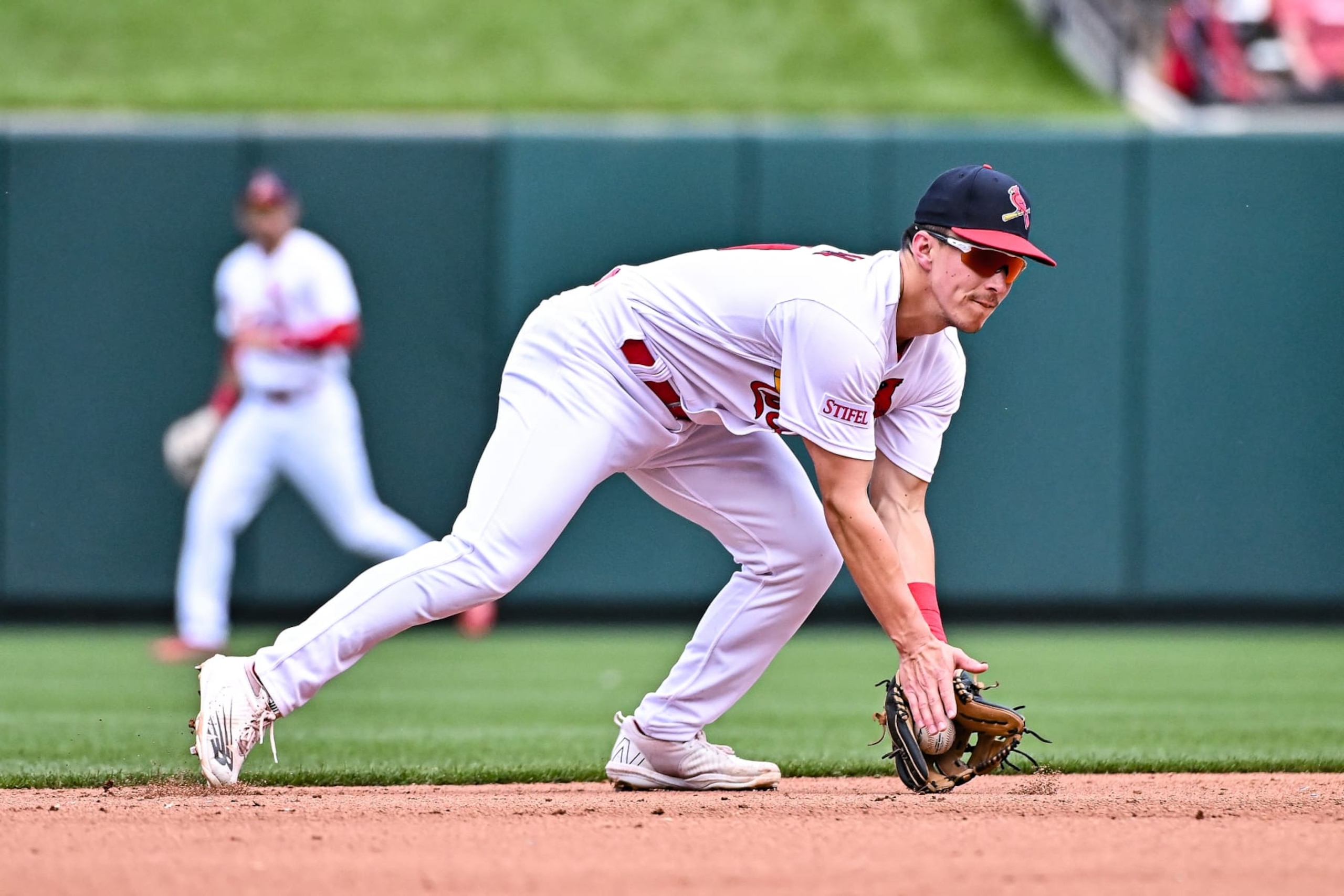 ST. LOUIS, MO - MAY 07: St. Louis Cardinals shortstop Tommy Edman (19) uses both hands to field the ground ball during a game between the Detroit Tigers and the St. Louis Cardinals on May 07, 2022, at Busch Stadium in St. Louis MO (Photo by Rick Ulreich/Icon Sportswire via Getty Images)