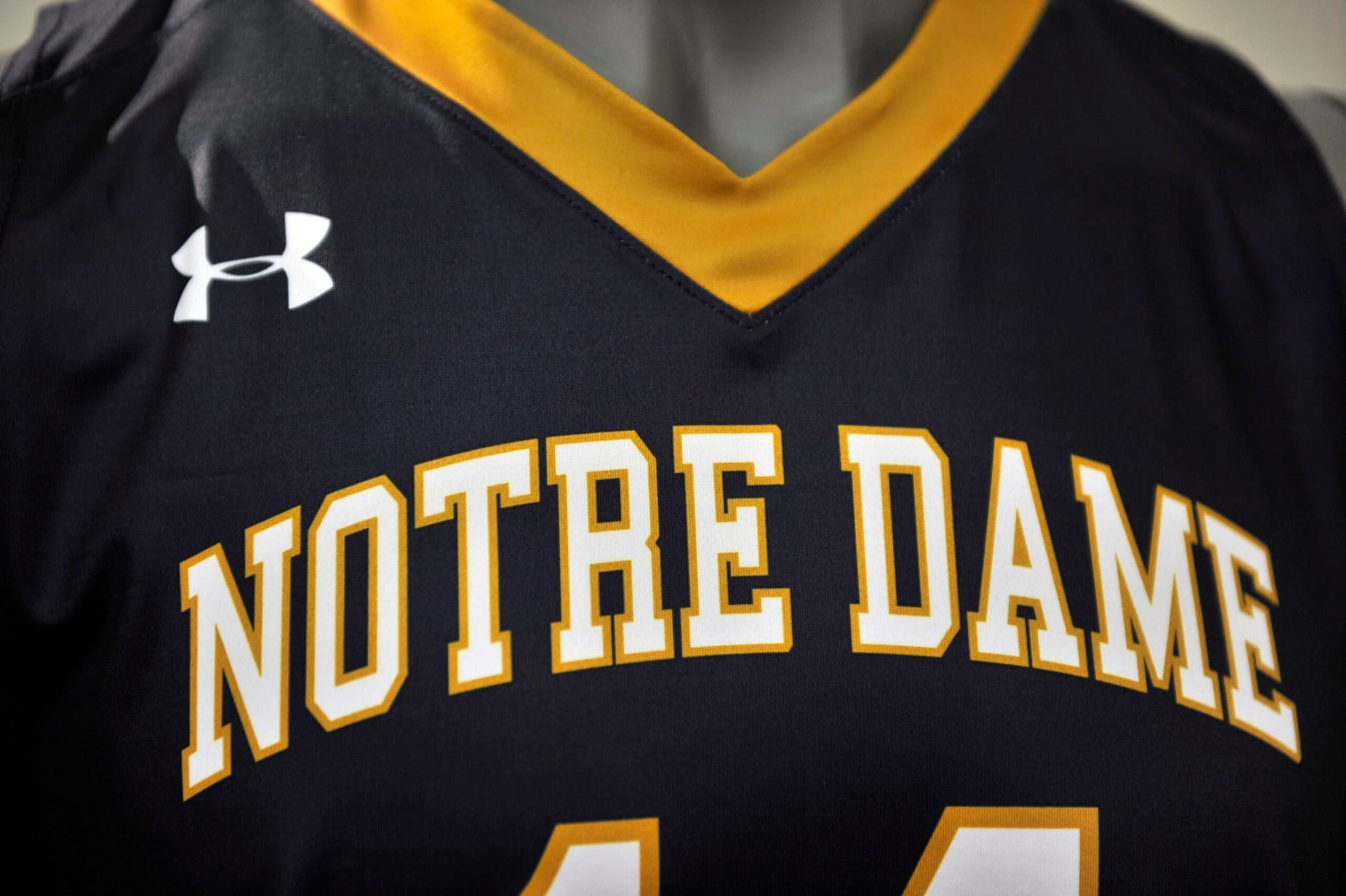 A new Notre Dame basketball uniform is displayed at a news conference Tuesday Jan. 21, 2014, in South Bend, Ind., announcing an agreement between Notre Dame and Under Armour that will outfit the university's athletic teams (AP Photo/Joe Raymond) A new Notre Dame basketball uniform is displayed at a news conference Tuesday Jan. 21, 2014, in South Bend, Ind., announcing an agreement between Notre Dame and Under Armour that will outfit the university's athletic teams (AP Photo/Joe Raymond)