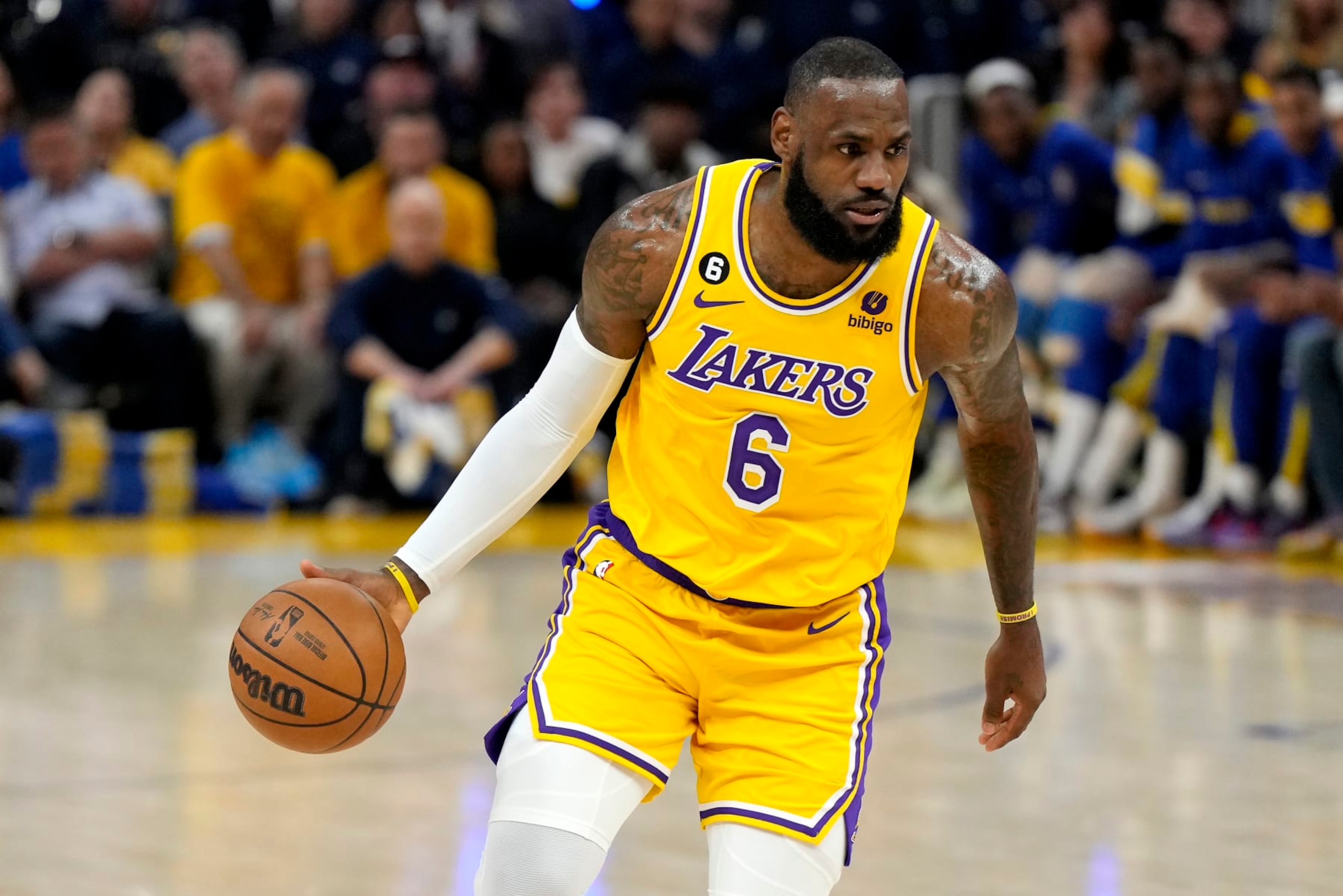 SAN FRANCISCO, CALIFORNIA - MAY 10: LeBron James #6 of the Los Angeles Lakers brings the ball up court during the first quarter against the Golden State Warriors in game five of the Western Conference Semifinal Playoffs at Chase Center on May 10, 2023 in San Francisco, California. NOTE TO USER: User expressly acknowledges and agrees that, by downloading and or using this photograph, User is consenting to the terms and conditions of the Getty Images License Agreement. (Photo by Thearon W. Henderson/Getty Images)