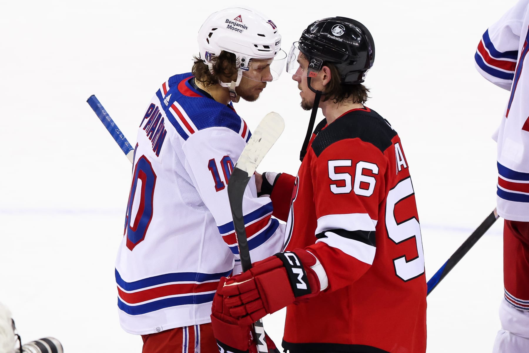 NEWARK, NJ - MAY 01: New York Rangers left wing Artemi Panarin (10) and New Jersey Devils left wing Erik Haula (56) exchange hand shakes at the end of Game 7 of an Eastern Conference First Round playoff game between the New York Rangers and the New Jersey Devils on May 1, 2023, at Prudential Center in Newark, New Jersey. (Photo by Andrew Mordzynski/Icon Sportswire via Getty Images)