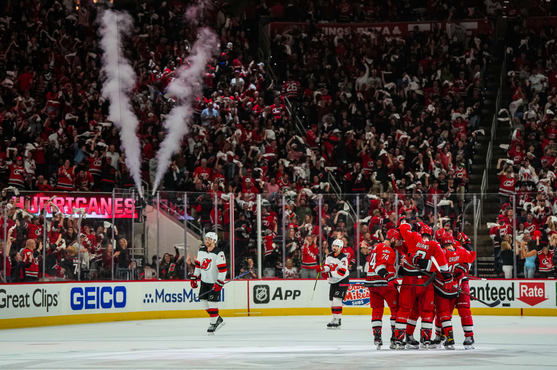 RALEIGH, NORTH CAROLINA - MAY 11: Brent Burns #8 of the Carolina Hurricanes celebrates with teammates after a goal during the second period against the New Jersey Devils in Game Five of the Second Round of the 2023 Stanley Cup Playoffs at PNC Arena on May 11, 2023 in Raleigh, North Carolina. (Photo by Josh Lavallee/NHLI via Getty Images)