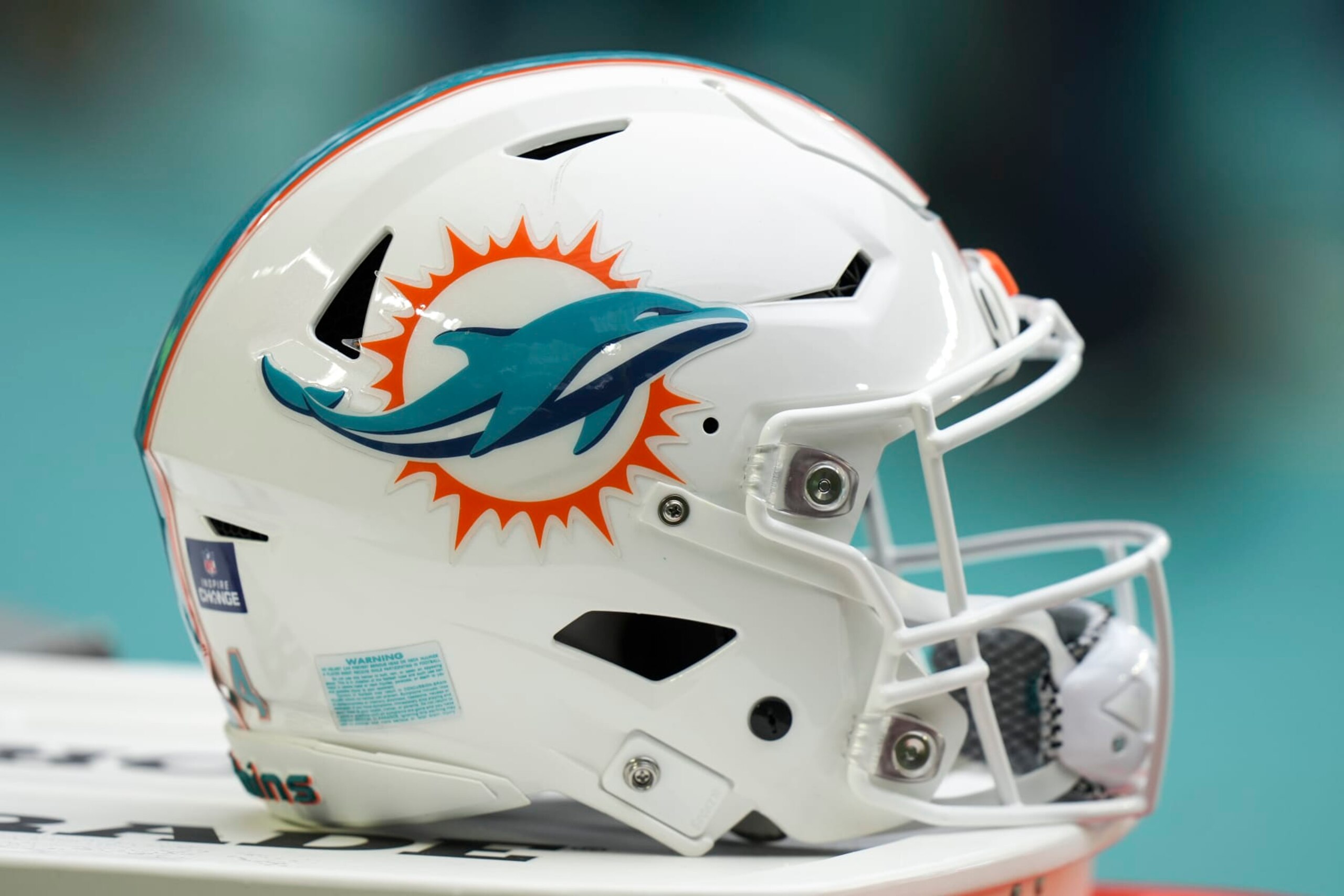 MIAMI GARDENS, FL - DECEMBER 25: a Miami Dolphins helmet rests near the sidelines during the game between the Green Bay Packers and the Miami Dolphins on Sunday, December 25, 2022 at Hard Rock Stadium, Miami Gardens, Fla. (Photo by Peter Joneleit/Icon Sportswire via Getty Images)