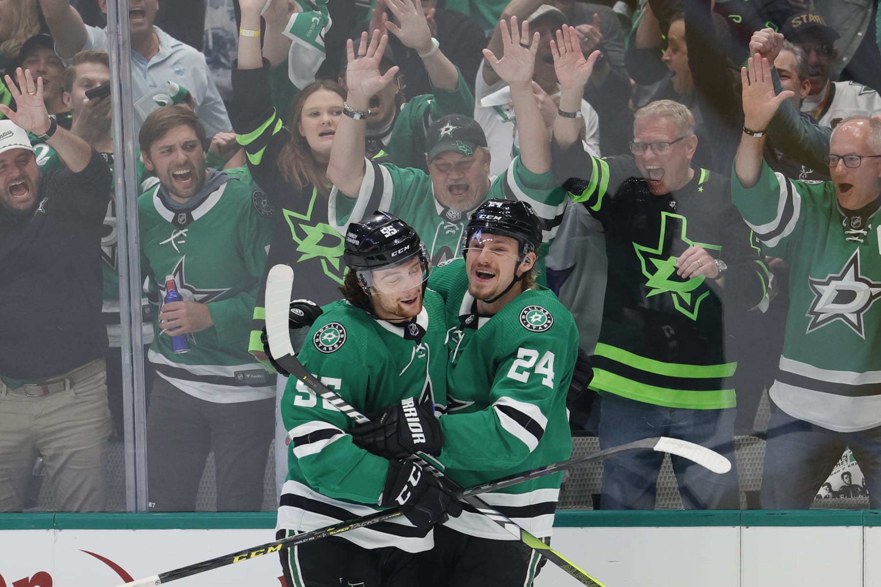 DALLAS, TEXAS - MAY 11: Roope Hintz #24 of the Dallas Stars celebrates his goal with Thomas Harley #55 during the first period  against the Seattle Kraken in Game Five of the Second Round of the 2023 Stanley Cup Playoffs at American Airlines Center on May 11, 2023 in Dallas, Texas. (Photo by Carmen Mandato/Getty Images)
