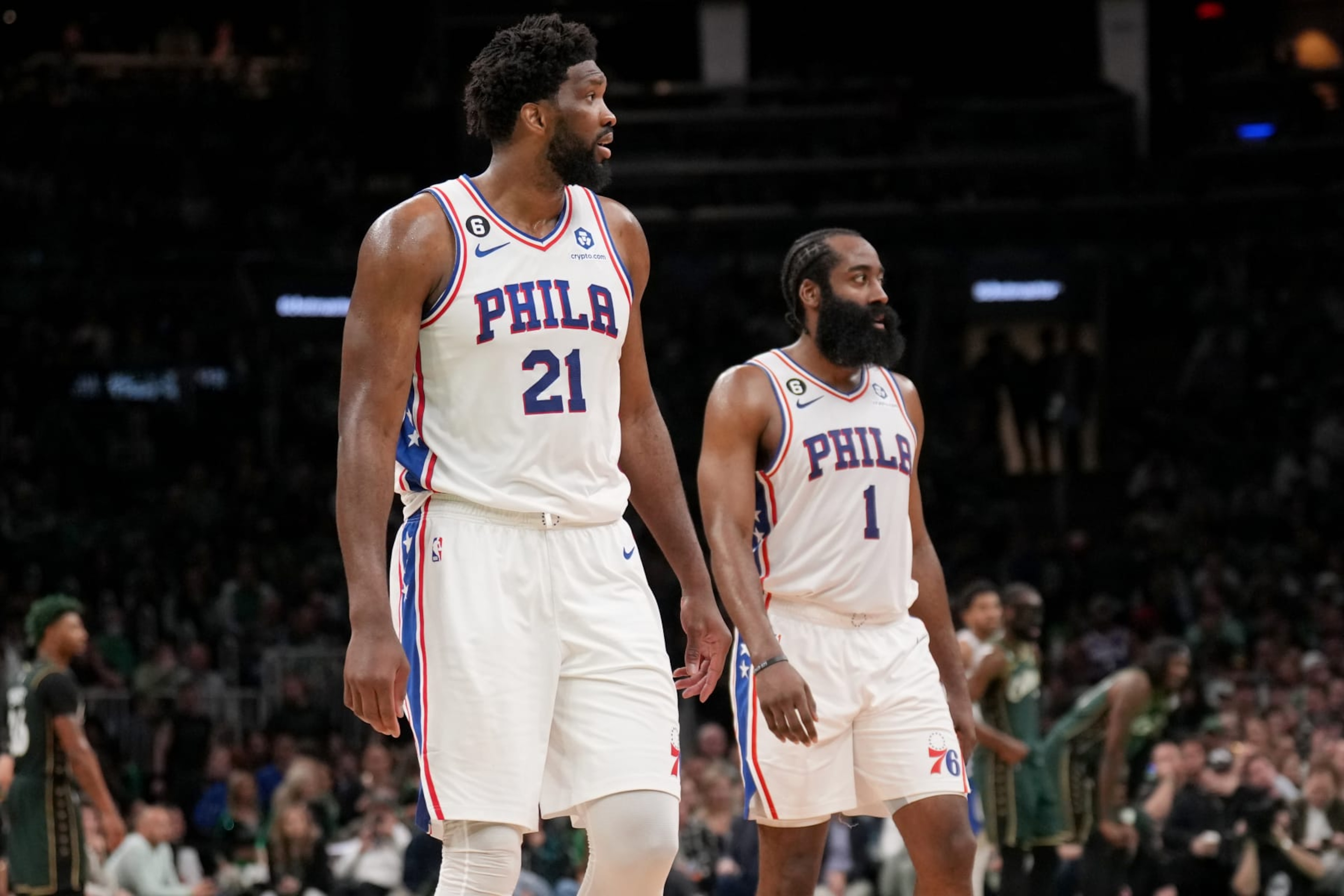 BOSTON, MA - MAY 9: James Harden #1 of the Philadelphia 76ers talks with Joel Embiid #21 of the Philadelphia 76ers during the game against the Boston Celtics during Game 5 of the 2023 NBA Playoffs Eastern Conference semi-finals on May 9, 2023 at the TD Garden in Boston, Massachusetts. NOTE TO USER: User expressly acknowledges and agrees that, by downloading and or using this photograph, User is consenting to the terms and conditions of the Getty Images License Agreement. Mandatory Copyright Notice: Copyright 2023 NBAE  (Photo by Jesse D. Garrabrant/NBAE via Getty Images)