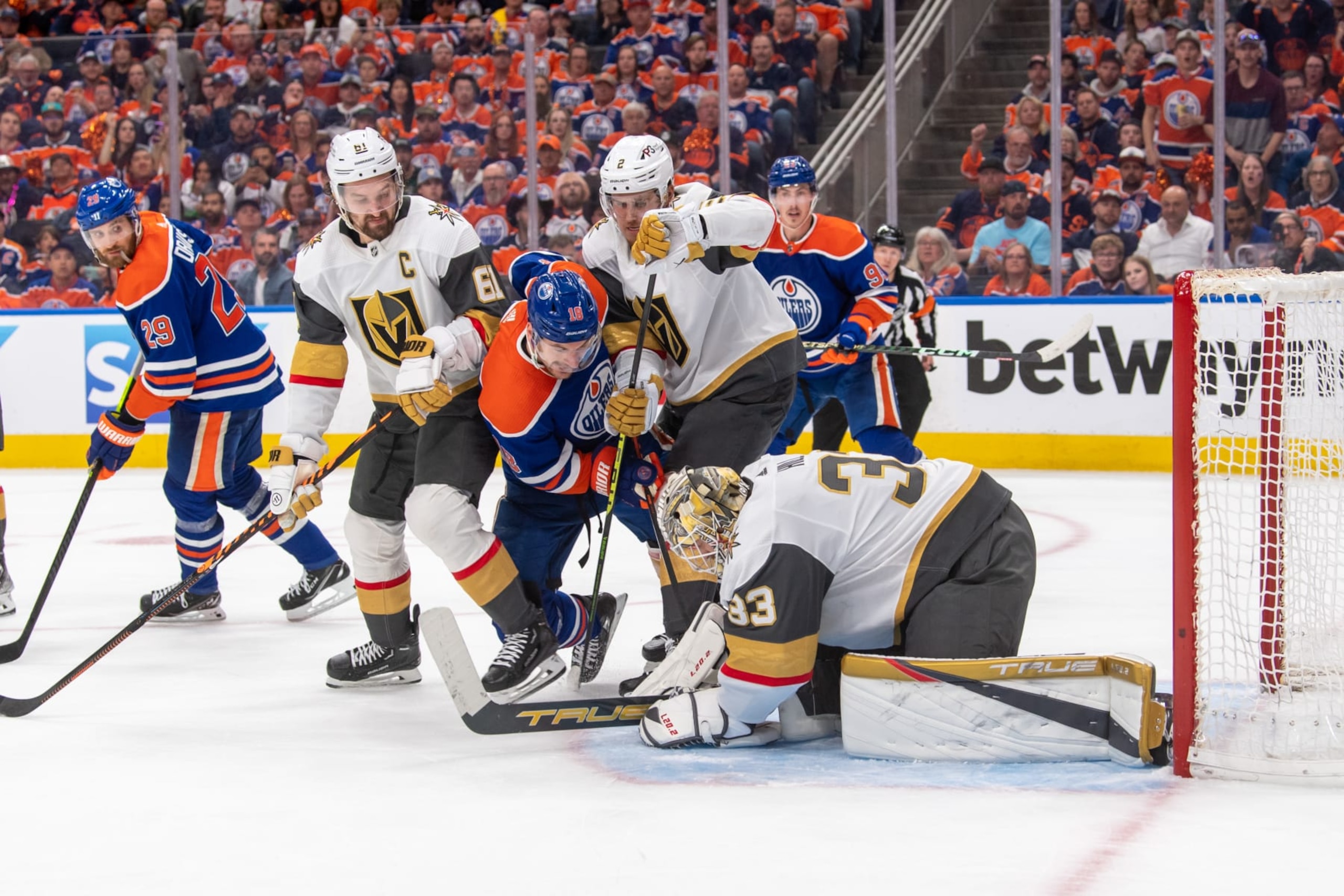 EDMONTON, CANADA - MAY 10: Adin Hill #33 of the Vegas Golden Knights makes a save against Zach Hyman #18 of the Edmonton Oilers in Game Four of the Second Round of the 2023 Stanley Cup Playoffs at Rogers Place on May 10, 2023, in Edmonton, Alberta, Canada. (Photo by Andy Devlin/NHLI via Getty Images)