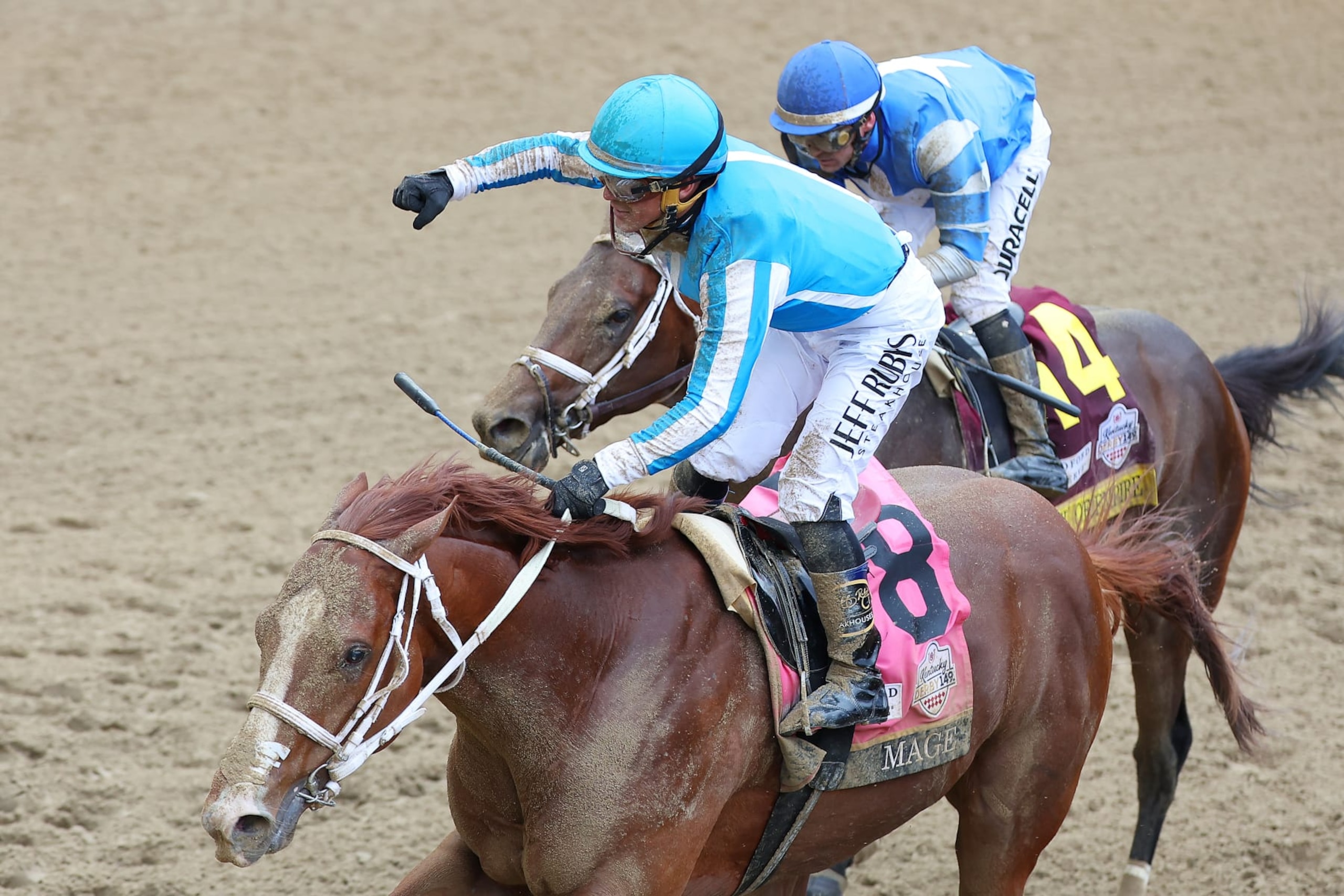 LOUISVILLE, KENTUCKY - MAY 06: Javier Castellano celebrates atop Mage #8, after crossing the finish line to win the 149th running of the Kentucky Derby at Churchill Downs on May 06, 2023 in Louisville, Kentucky. (Photo by Michael Reaves/Getty Images)