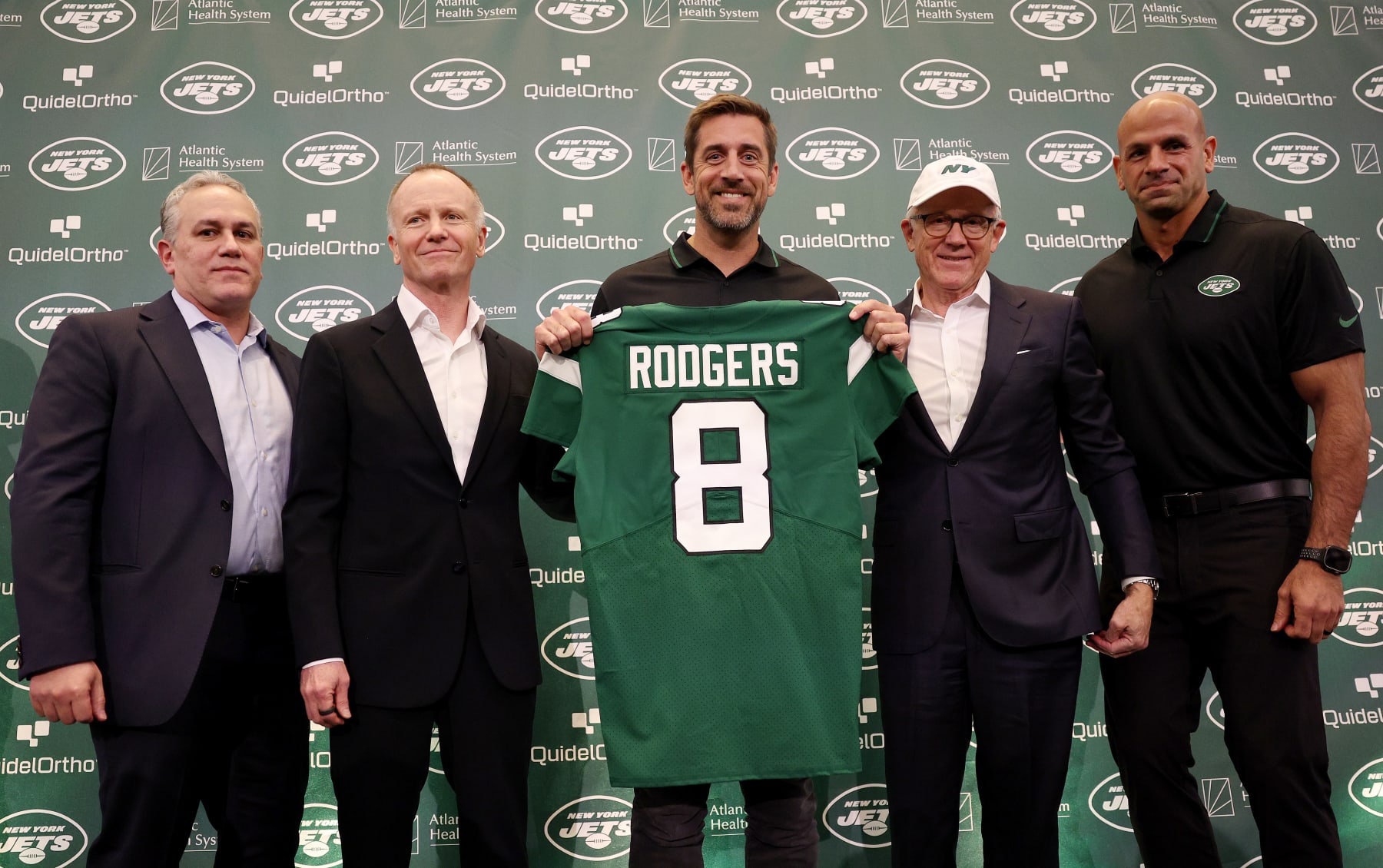 New York Jets team president Hymie Elhai, team owner Christopher Johnson, quarterback Aaron Rodgers, team owner Woody Johnson, and head coach Robert Saleh