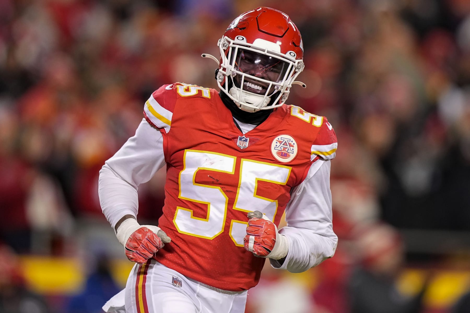 Kansas City Chiefs defensive end Frank Clark (55) celebrates his sacking of Cincinnati Bengals quarterback Joe Burrow during the first half of the NFL AFC Championship playoff football game, Sunday, Jan. 29, 2023, in Kansas City, Mo. (AP Photo/Brynn Anderson)