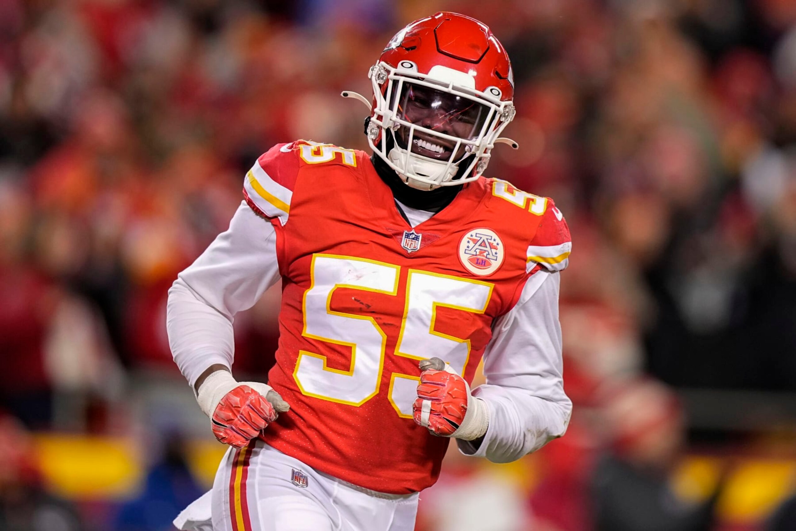Kansas City Chiefs defensive end Frank Clark (55) celebrates his sacking of Cincinnati Bengals quarterback Joe Burrow during the first half of the NFL AFC Championship playoff football game, Sunday, Jan. 29, 2023, in Kansas City, Mo. (AP Photo/Brynn Anderson)