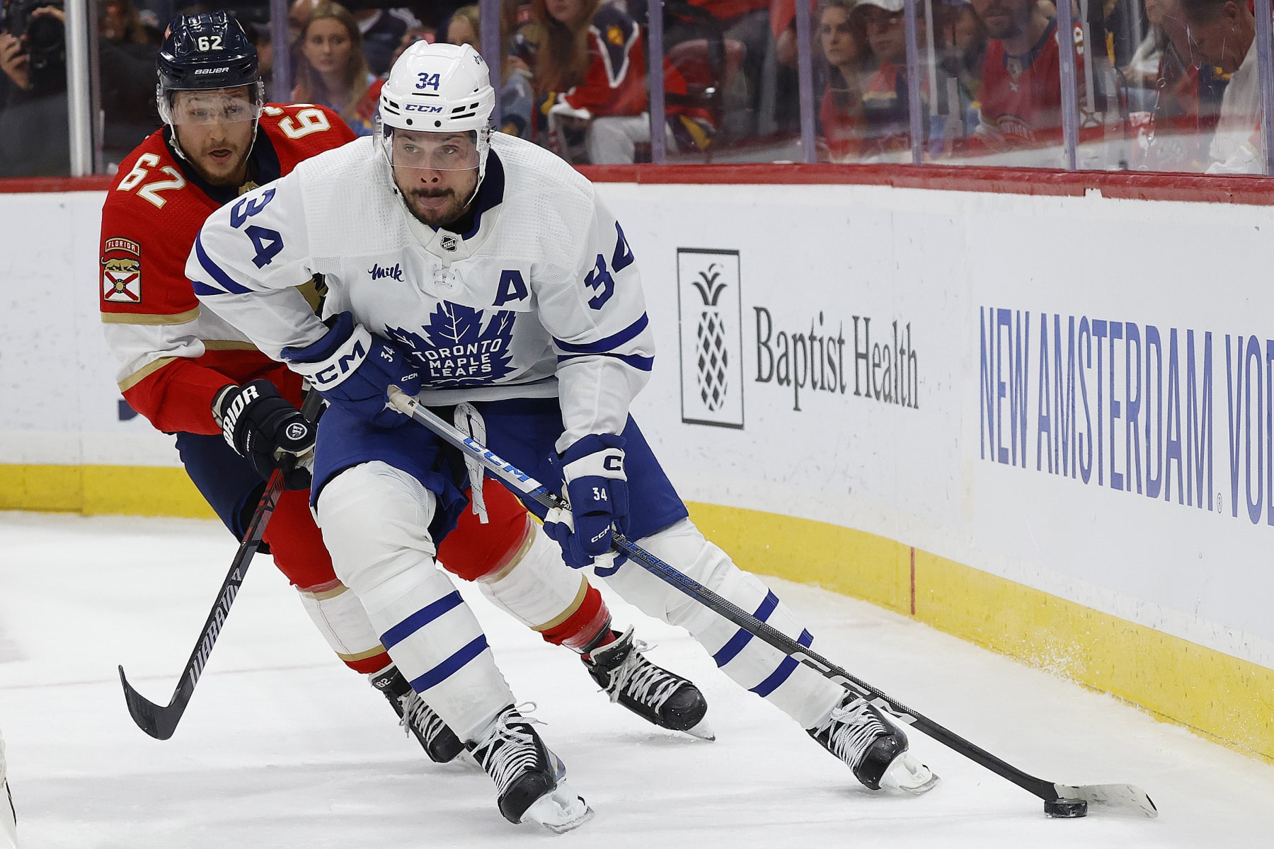 SUNRISE, FLORIDA - MAY 10: Auston Matthews #34 of the Toronto Maple Leafs skates with the puck against Brandon Montour #62 of the Florida Panthers in Game Four of the Second Round of the 2023 Stanley Cup Playoffs at the FLA Live Arena on May 10, 2023 in Sunrise, Florida. (Photo by Eliot J. Schechter/NHLI via Getty Images)