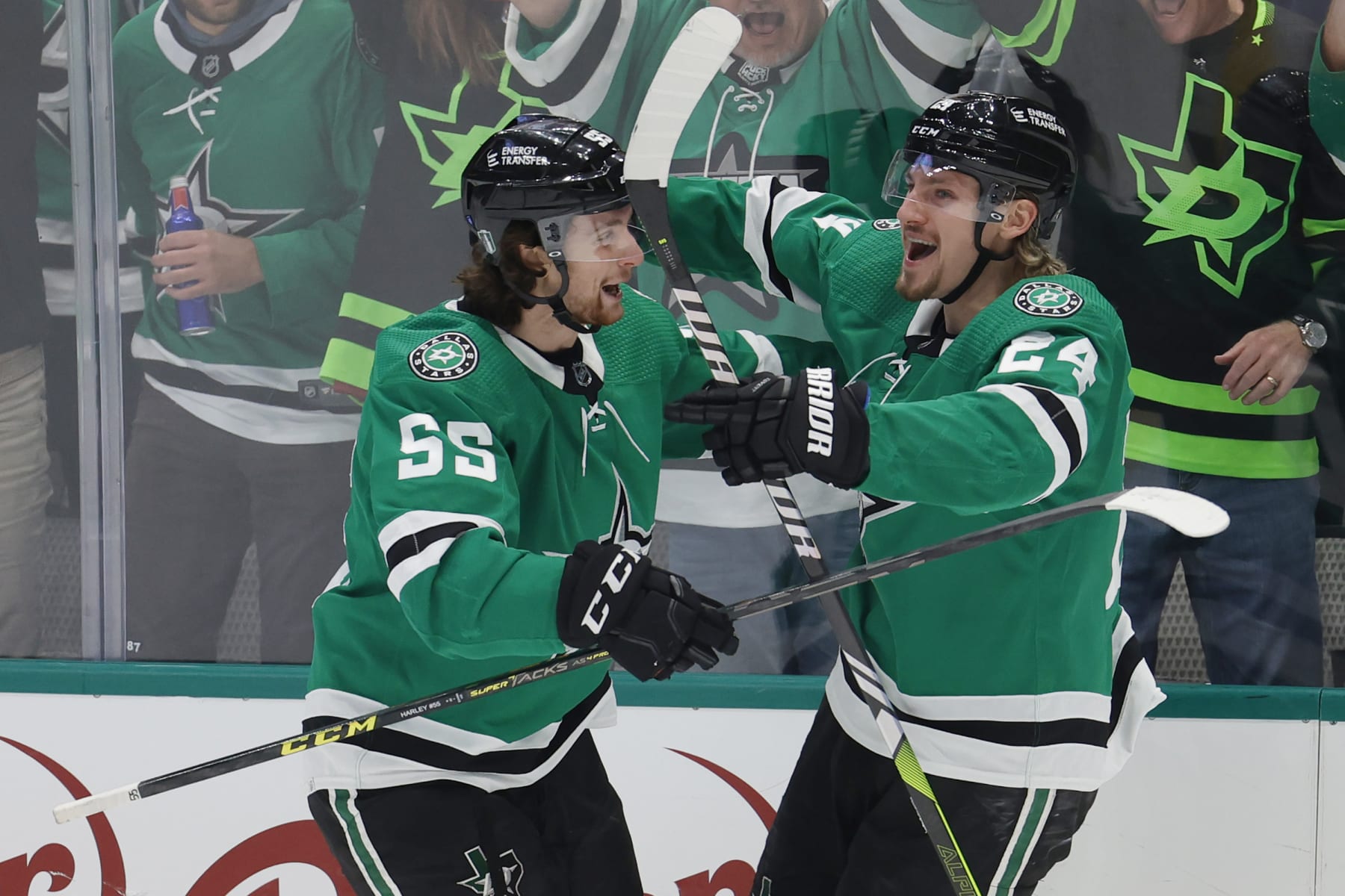 DALLAS, TEXAS - MAY 11: Roope Hintz #24 of the Dallas Stars celebrates his goal with Thomas Harley #55 during the first period  against the Seattle Kraken in Game Five of the Second Round of the 2023 Stanley Cup Playoffs at American Airlines Center on May 11, 2023 in Dallas, Texas. (Photo by Carmen Mandato/Getty Images)