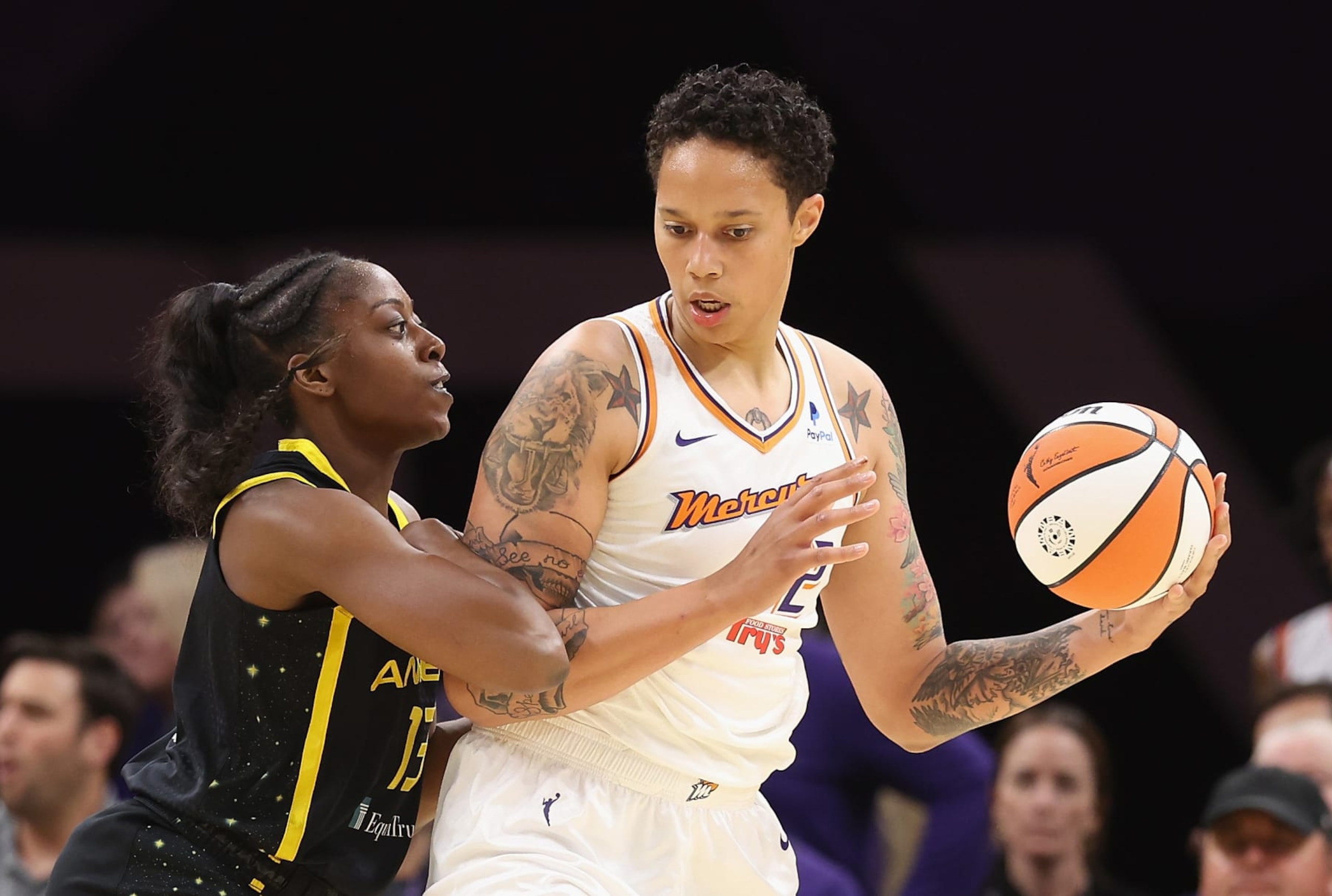 PHOENIX, ARIZONA - MAY 12: Brittney Griner #42 of the Phoenix Mercury handles the ball against Chiney Ogwumike #13 of the Los Angeles Sparks during the first half of the WNBA game at Footprint Center on May 12, 2023 in Phoenix, Arizona. NOTE TO USER: User expressly acknowledges and agrees that, by downloading and or using this photograph, User is consenting to the terms and conditions of the Getty Images License Agreement. (Photo by Christian Petersen/Getty Images) PHOENIX, ARIZONA - MAY 12: Brittney Griner #42 of the Phoenix Mercury handles the ball against Chiney Ogwumike #13 of the Los Angeles Sparks during the first half of the WNBA game at Footprint Center on May 12, 2023 in Phoenix, Arizona. NOTE TO USER: User expressly acknowledges and agrees that, by downloading and or using this photograph, User is consenting to the terms and conditions of the Getty Images License Agreement. (Photo by Christian Petersen/Getty Images)