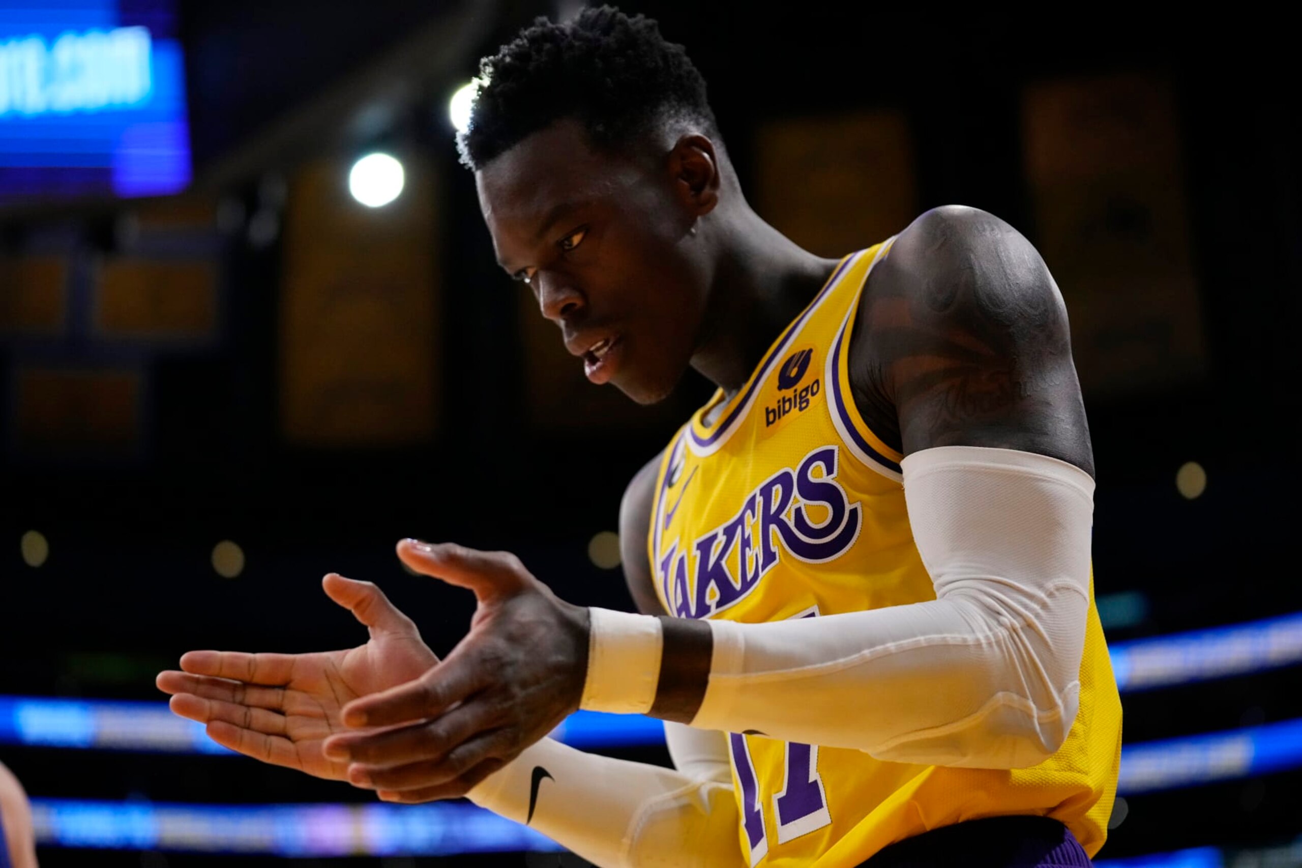 Los Angeles Lakers guard Dennis Schroder (17) claps during the first half in Game 6 of an NBA basketball Western Conference semifinal series against the Golden State Warriors Friday, May 12, 2023, in Los Angeles. (AP Photo/Ashley Landis)