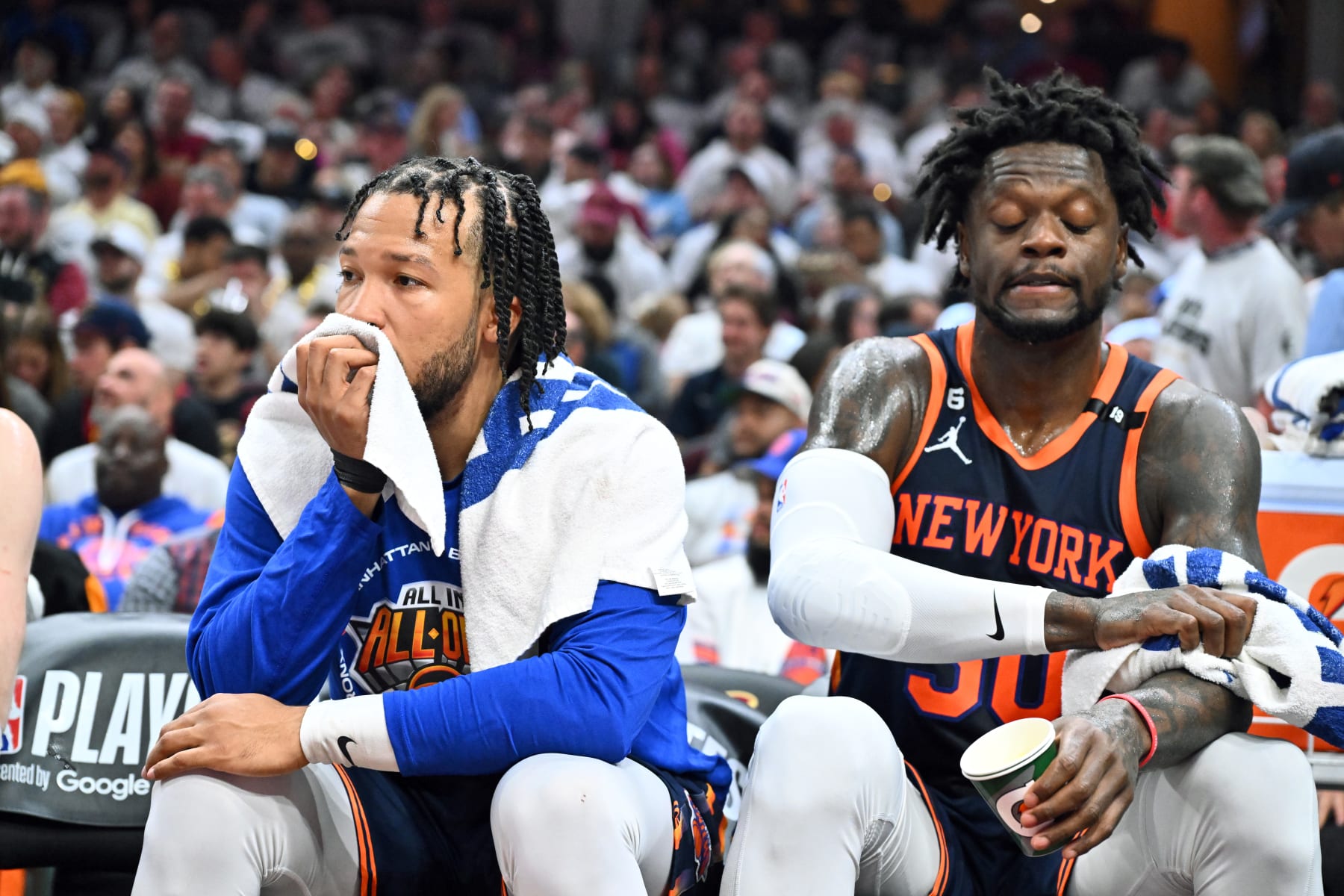 CLEVELAND, OHIO - APRIL 15: Jalen Brunson #11 and Julius Randle #30 of the New York Knicks watch from the bench during the second quarter of Game One of the Eastern Conference First Round Playoffs against the Cleveland Cavaliers at Rocket Mortgage Fieldhouse on April 15, 2023 in Cleveland, Ohio. NOTE TO USER: User expressly acknowledges and agrees that, by downloading and or using this photograph, User is consenting to the terms and conditions of the Getty Images License Agreement. (Photo by Jason Miller/Getty Images)