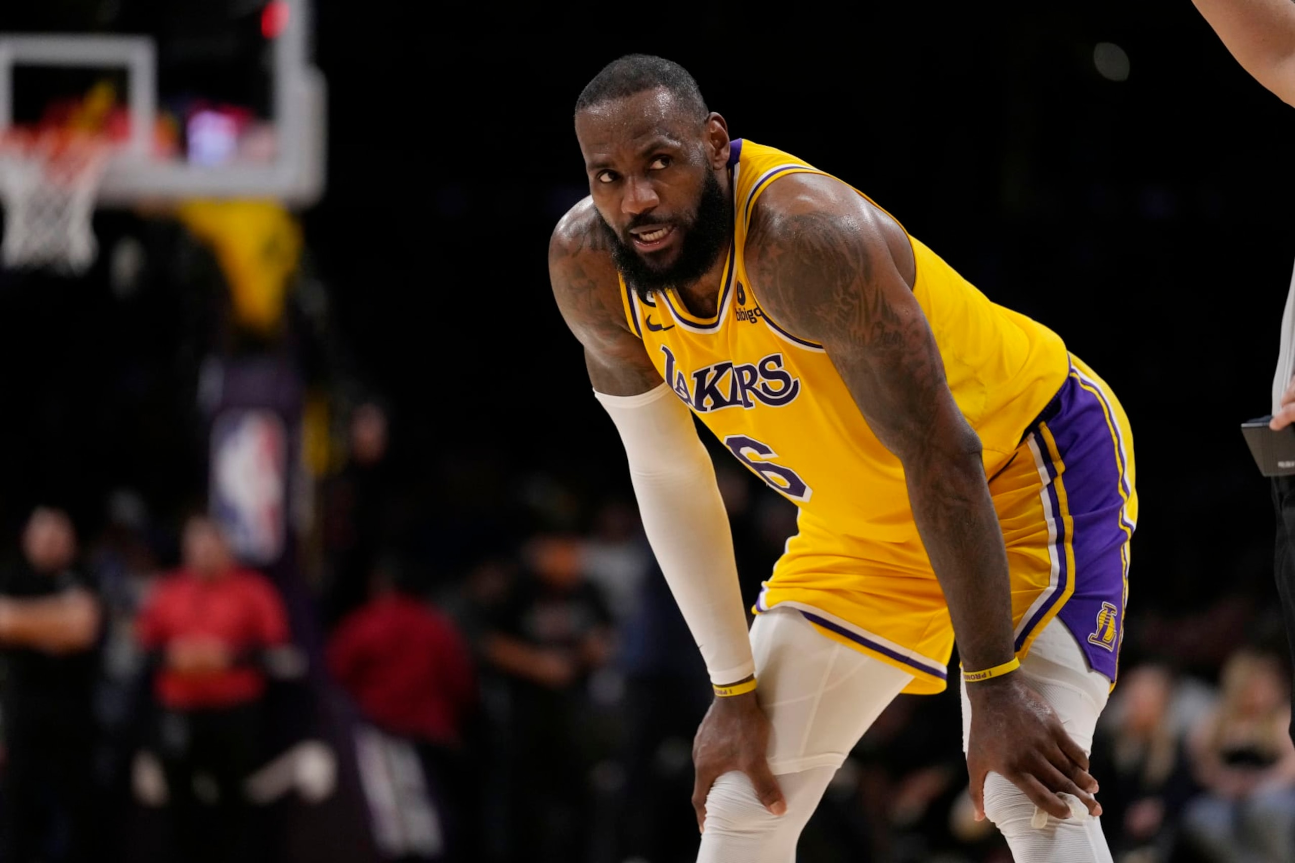 Los Angeles Lakers forward LeBron James stands on the court during the second half in Game 6 of an NBA basketball Western Conference semifinal series against the Golden State Warriors Friday, May 12, 2023, in Los Angeles. (AP Photo/Ashley Landis)