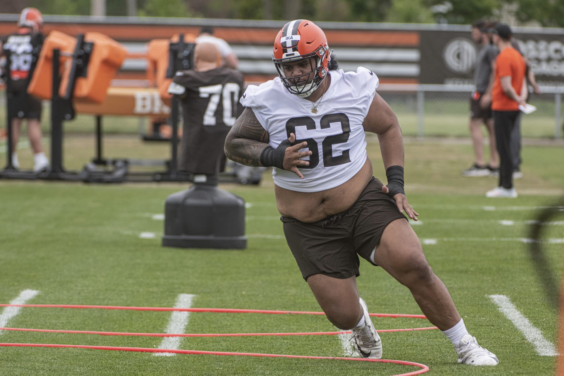 Cleveland Browns rookie Siaki Ika runs a drill at the NFL team's rookie minicamp in Berea, Ohio, Friday, May 12, 2023. (AP Photo/Phil Long)