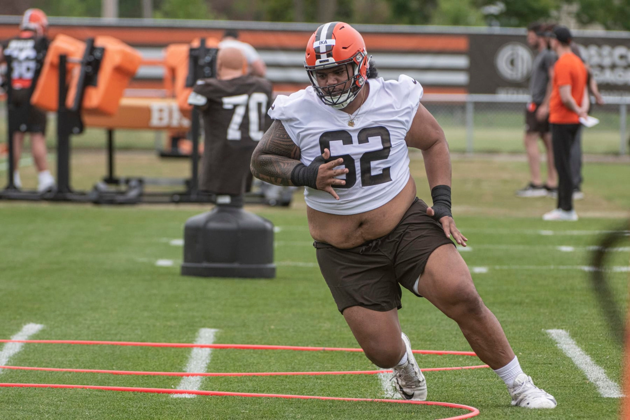 Cleveland Browns rookie Siaki Ika runs a drill at the NFL team's rookie minicamp in Berea, Ohio, Friday, May 12, 2023. (AP Photo/Phil Long)