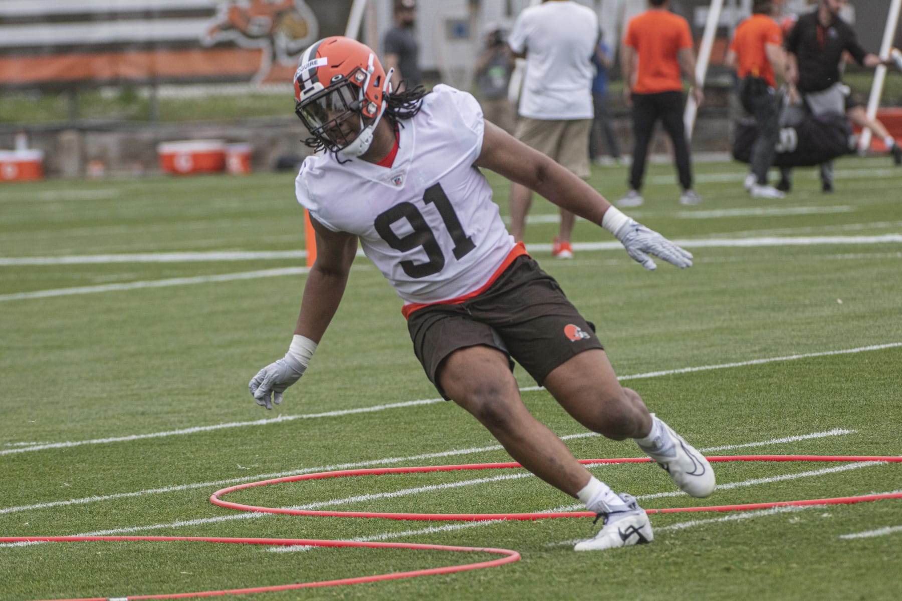 Cleveland Browns rookie Isaiah McGuire runs a drill at the NFL team's rookie minicamp in Berea, Ohio, Friday, May 12, 2023. (AP Photo/Phil Long)