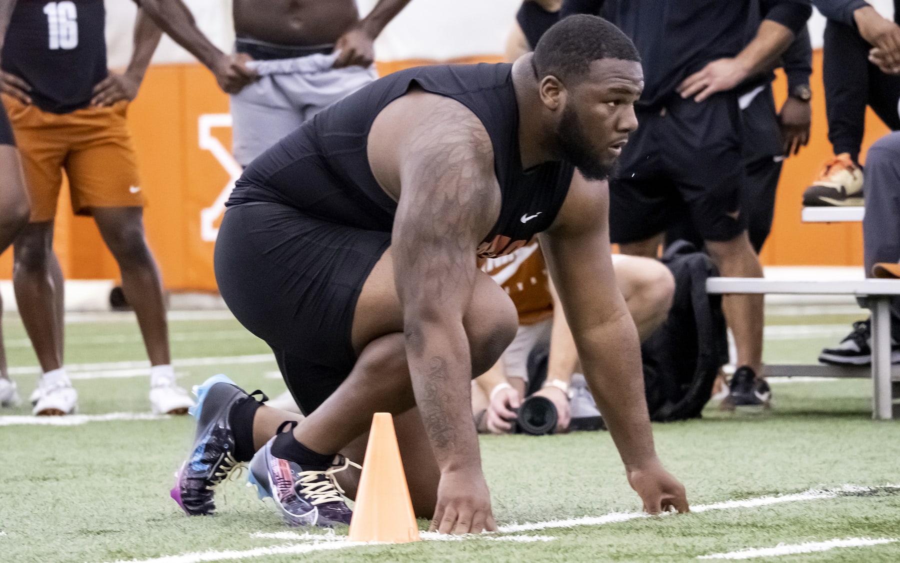 Texas defensive lineman Keondre Coburn prepares to start an agility test during Texas Pro Day, Thursday, March 9, 2023, in Austin, Texas. (AP Photo/Rodolfo Gonzalez)