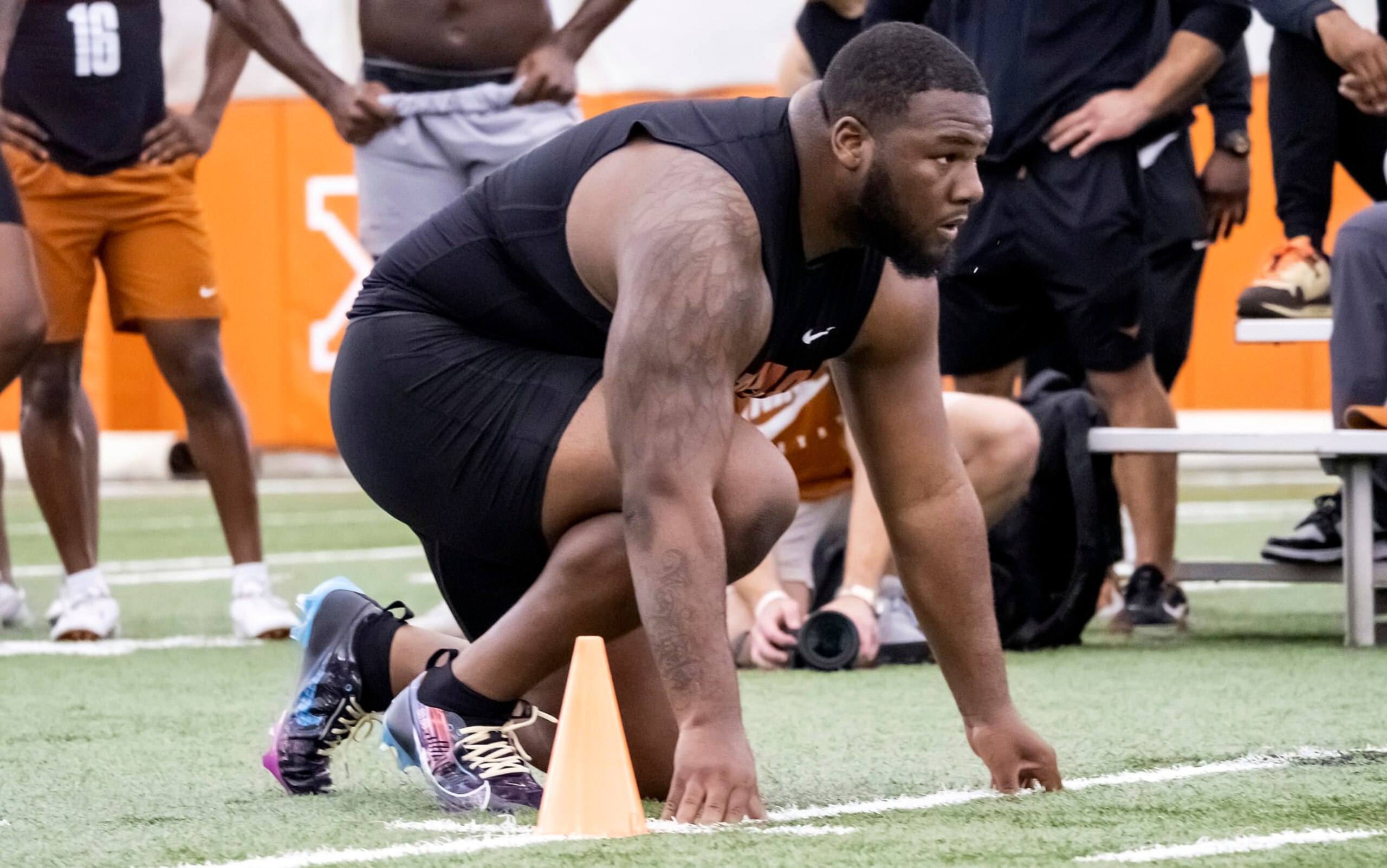 Texas defensive lineman Keondre Coburn prepares to start an agility test during Texas Pro Day, Thursday, March 9, 2023, in Austin, Texas. (AP Photo/Rodolfo Gonzalez)