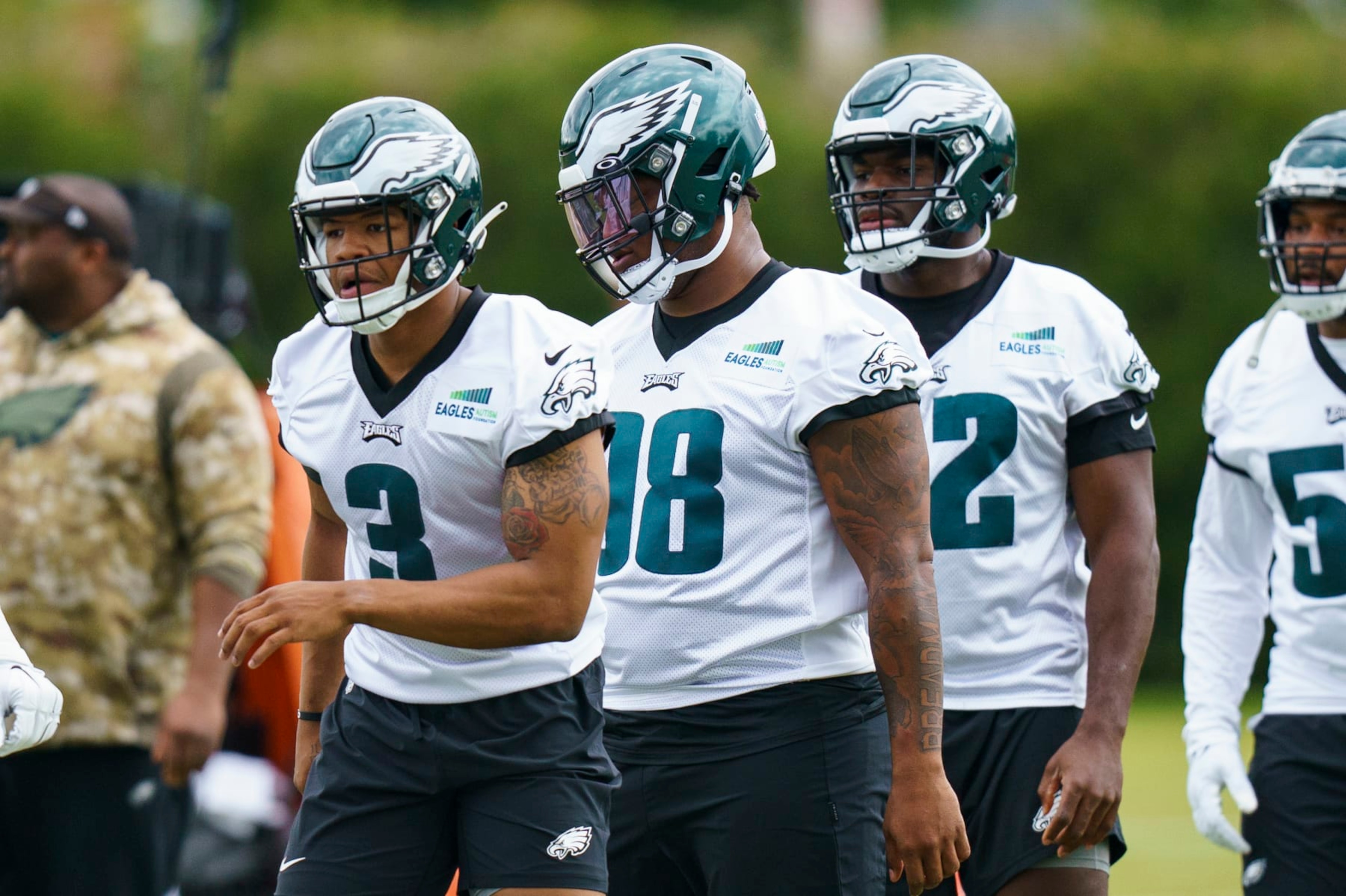 Philadelphia Eagles' Nolan Smith, left, and Jalen Carter, center, looks on during NFL rookie football minicamp, Friday, May 5, 2023, in Philadelphia. (AP Photo/Chris Szagola) Philadelphia Eagles' Nolan Smith, left, and Jalen Carter, center, looks on during NFL rookie football minicamp, Friday, May 5, 2023, in Philadelphia. (AP Photo/Chris Szagola)