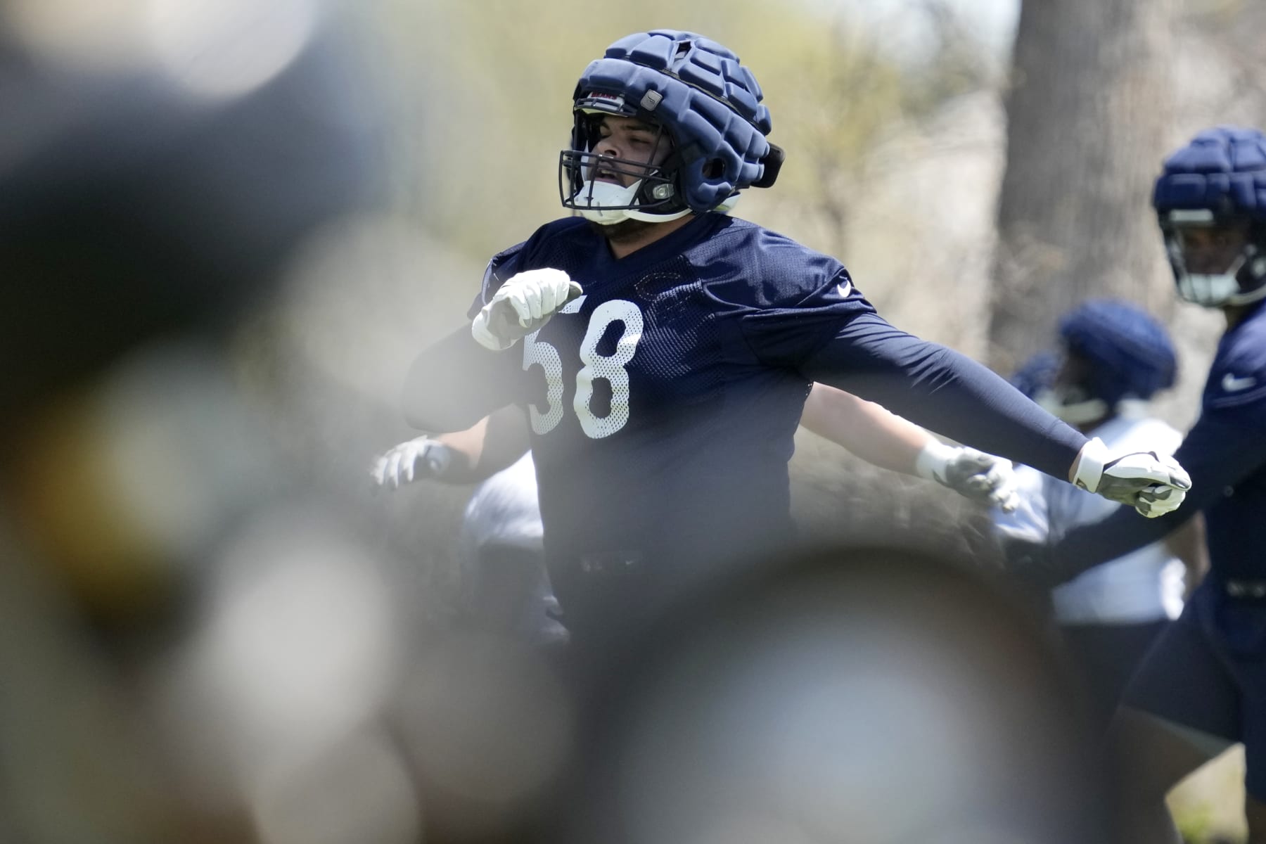 Chicago Bears offensive lineman Darnell Wright warms up during the NFL football team's rookie minicamp at Halas Hall in Lake Forest, Ill., Friday, May 5, 2023. (AP Photo/Nam Y. Huh)