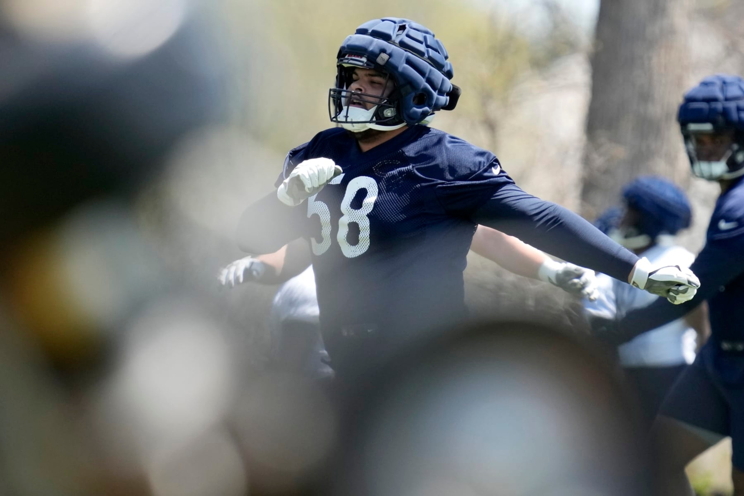 Chicago Bears offensive lineman Darnell Wright warms up during the NFL football team's rookie minicamp at Halas Hall in Lake Forest, Ill., Friday, May 5, 2023. (AP Photo/Nam Y. Huh)