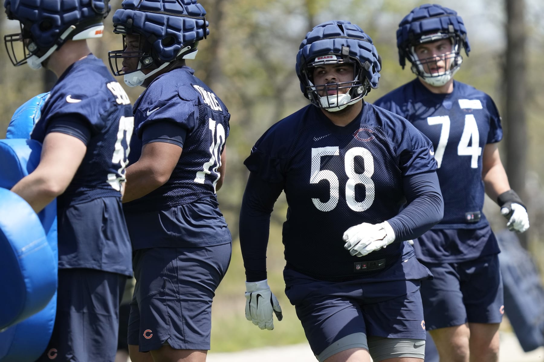Chicago Bears offensive lineman Darnell Wright works on the field during the NFL football team's rookie minicamp at Halas Hall in Lake Forest, Ill., Friday, May 5, 2023. (AP Photo/Nam Y. Huh)