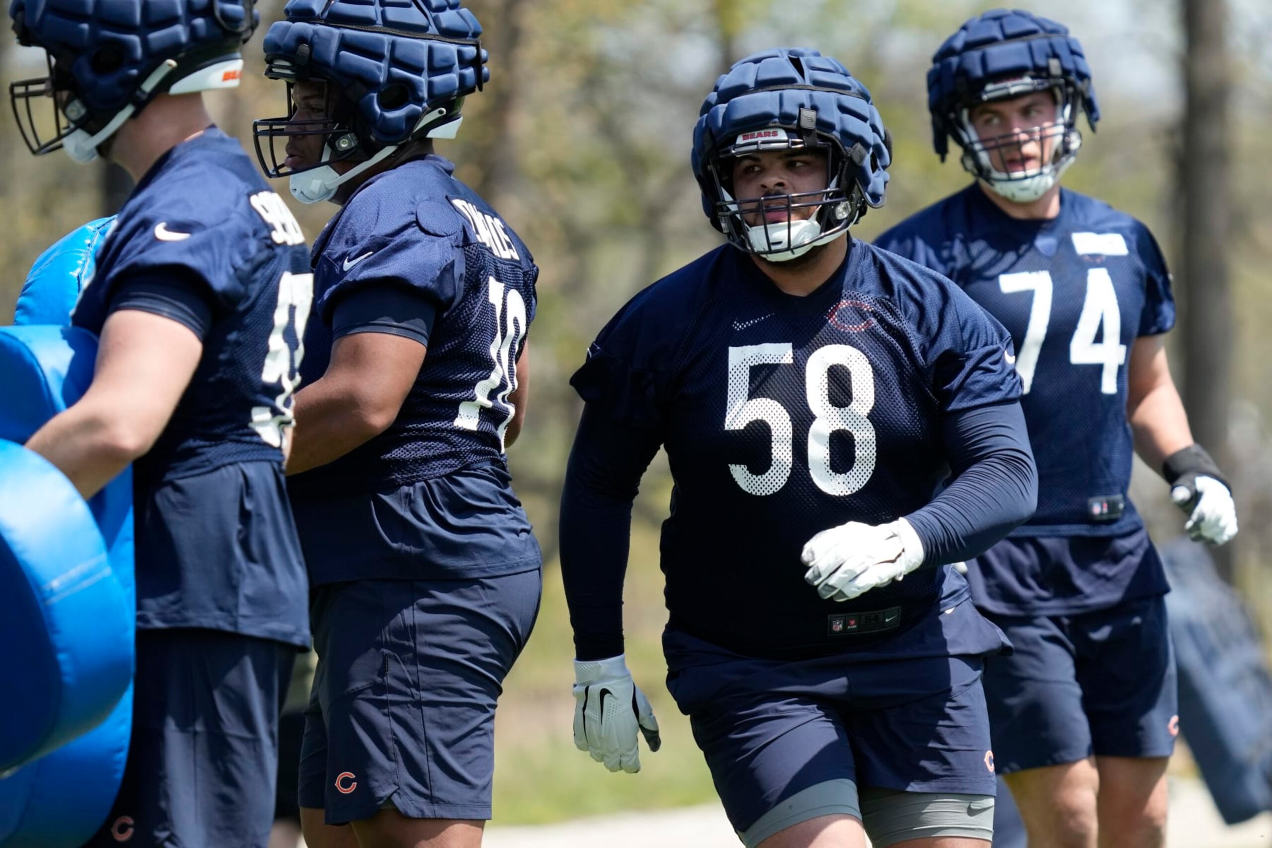 Chicago Bears offensive lineman Darnell Wright works on the field during the NFL football team's rookie minicamp at Halas Hall in Lake Forest, Ill., Friday, May 5, 2023. (AP Photo/Nam Y. Huh)