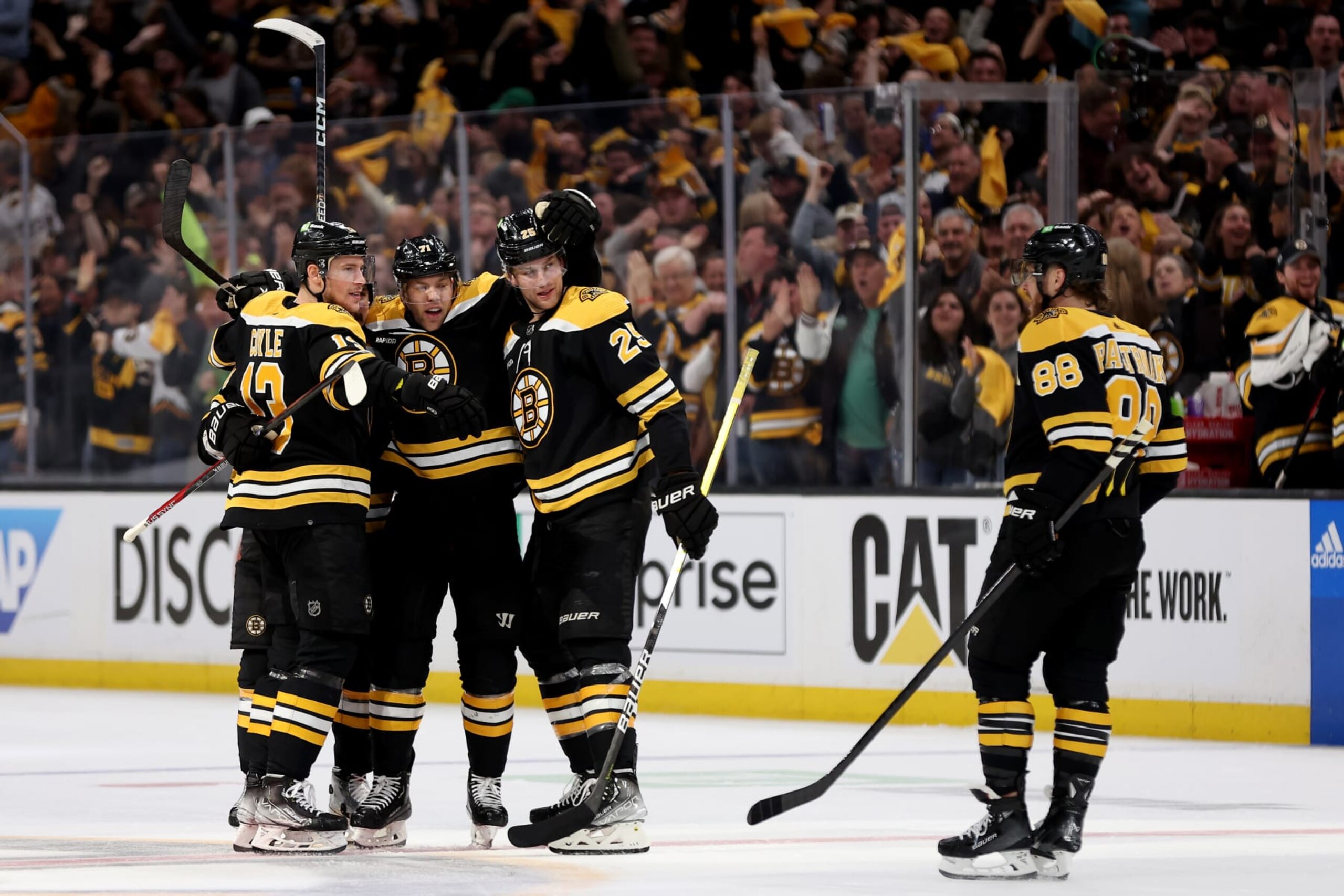 BOSTON, MASSACHUSETTS - APRIL 26: Taylor Hall #71 of the Boston Bruins celebrates with Dmitry Orlov #81, Brandon Carlo #25, Charlie Coyle #13 and David Pastrnak #88 after scoring a goal on Sergei Bobrovsky #72 of the Florida Panthers during the third period in Game Five of the First Round of the 2023 Stanley Cup Playoffs at TD Garden on April 26, 2023 in Boston, Massachusetts. (Photo by Maddie Meyer/Getty Images)