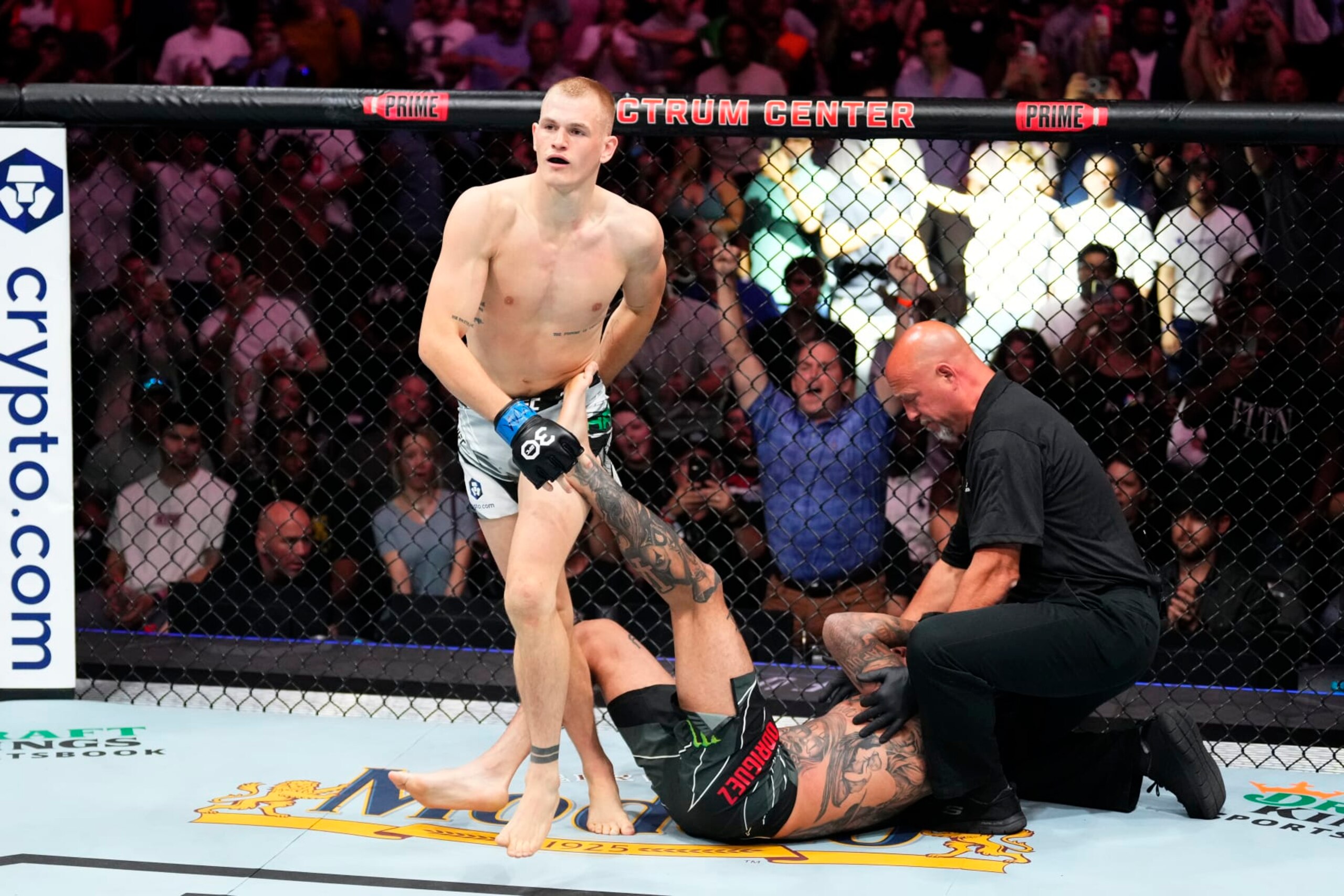 CHARLOTTE, NORTH CAROLINA - MAY 13:  (L-R) Ian Garry of Ireland reacts after his TKO victory over Daniel Rodriguez in their welterweight fight during the UFC Fight Night event at Spectrum Center on May 13, 2023 in Charlotte, North Carolina. (Photo by Jeff Bottari/Zuffa LLC via Getty Images)