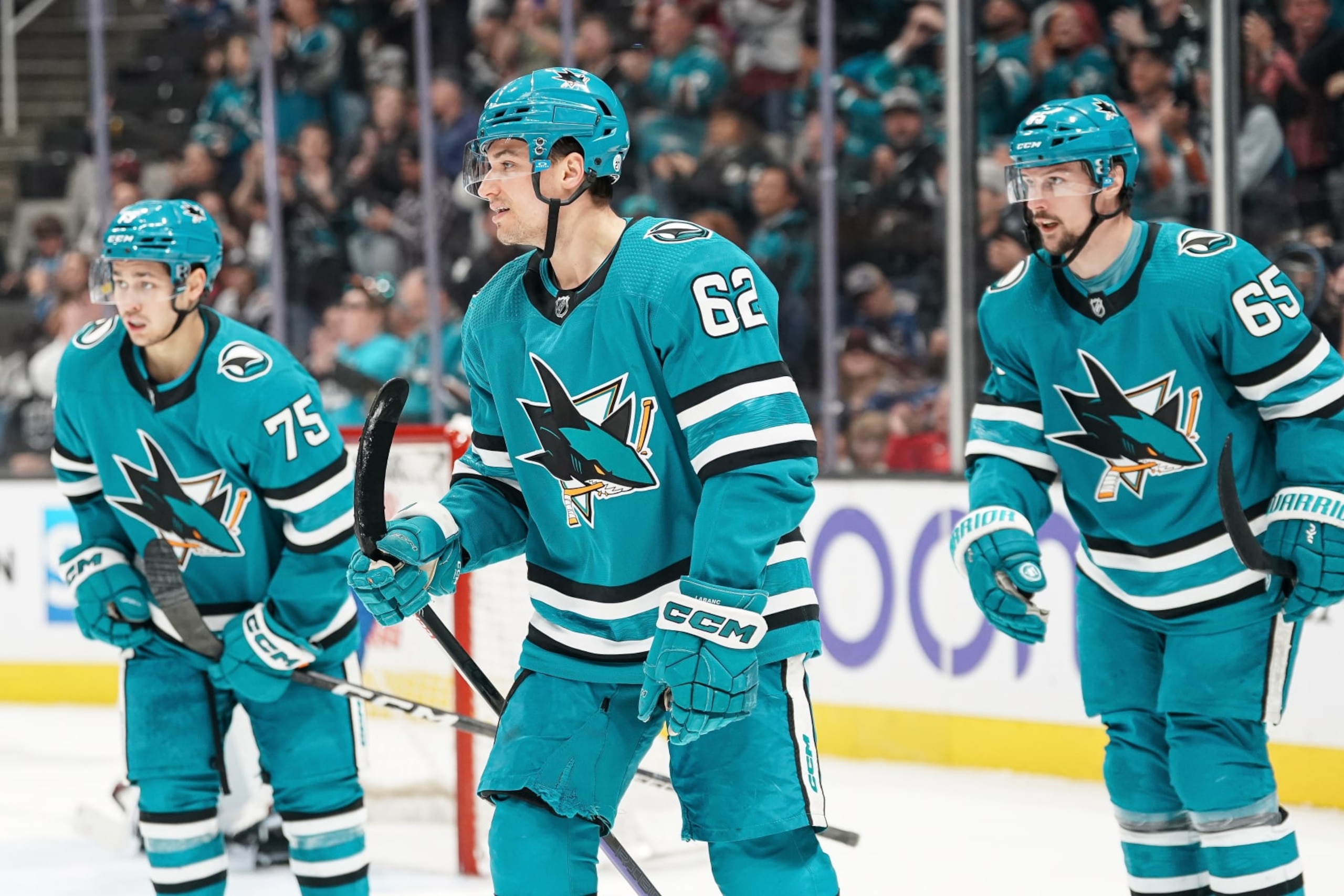 SAN JOSE, CA - APRIL 4: Kevin Labanc #62 and Erik Karlsson #65 of the San Jose Sharks celebrate scoring a goal in the second period against the Colorado Avalanche at SAP Center on April 4, 2023 in San Jose, California. (Photo by Kavin Mistry/NHLI via Getty Images)