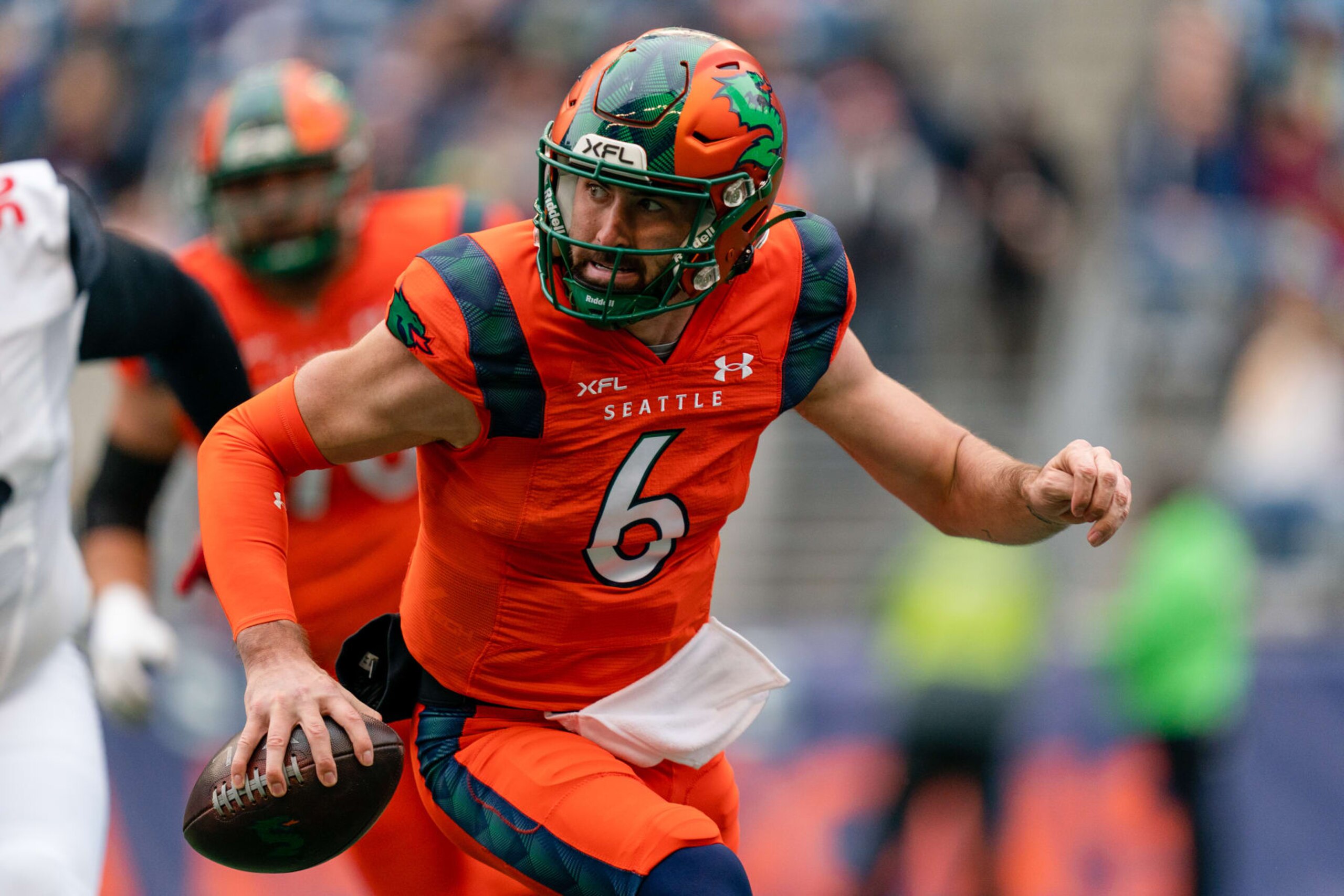 SEATTLE, WA - APRIL 23: Quarterback Ben DiNucci #6 of the Seattle Sea Dragons runs the ball during the first half of the game against the Vegas Vipers at Lumen Field on April 23, 2023 in Seattle, Washington. (Photo by Ali Gradischer/Getty Images)
