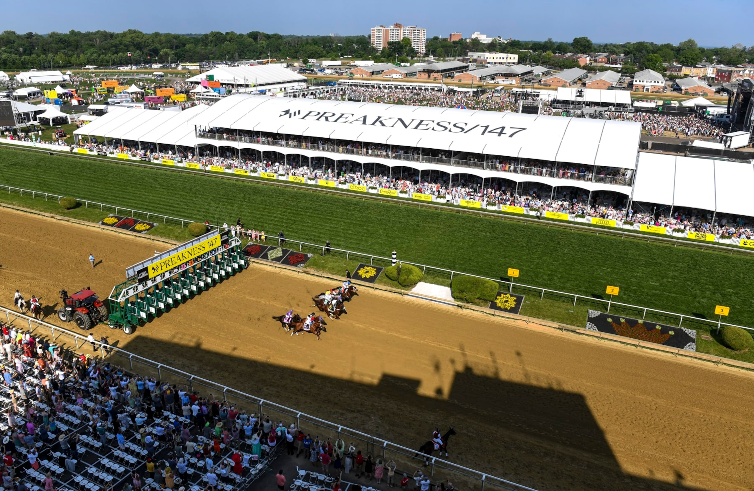 BALTIMORE, MD - MAY 21: Horses bolt from the starting gate for the 11th race, The Sir Barton Stkes, during the 147th running of the Preakness Stakes at Pimlico Race Course.  Photo by Jonathan Newton/The Washington Post via Getty Images)