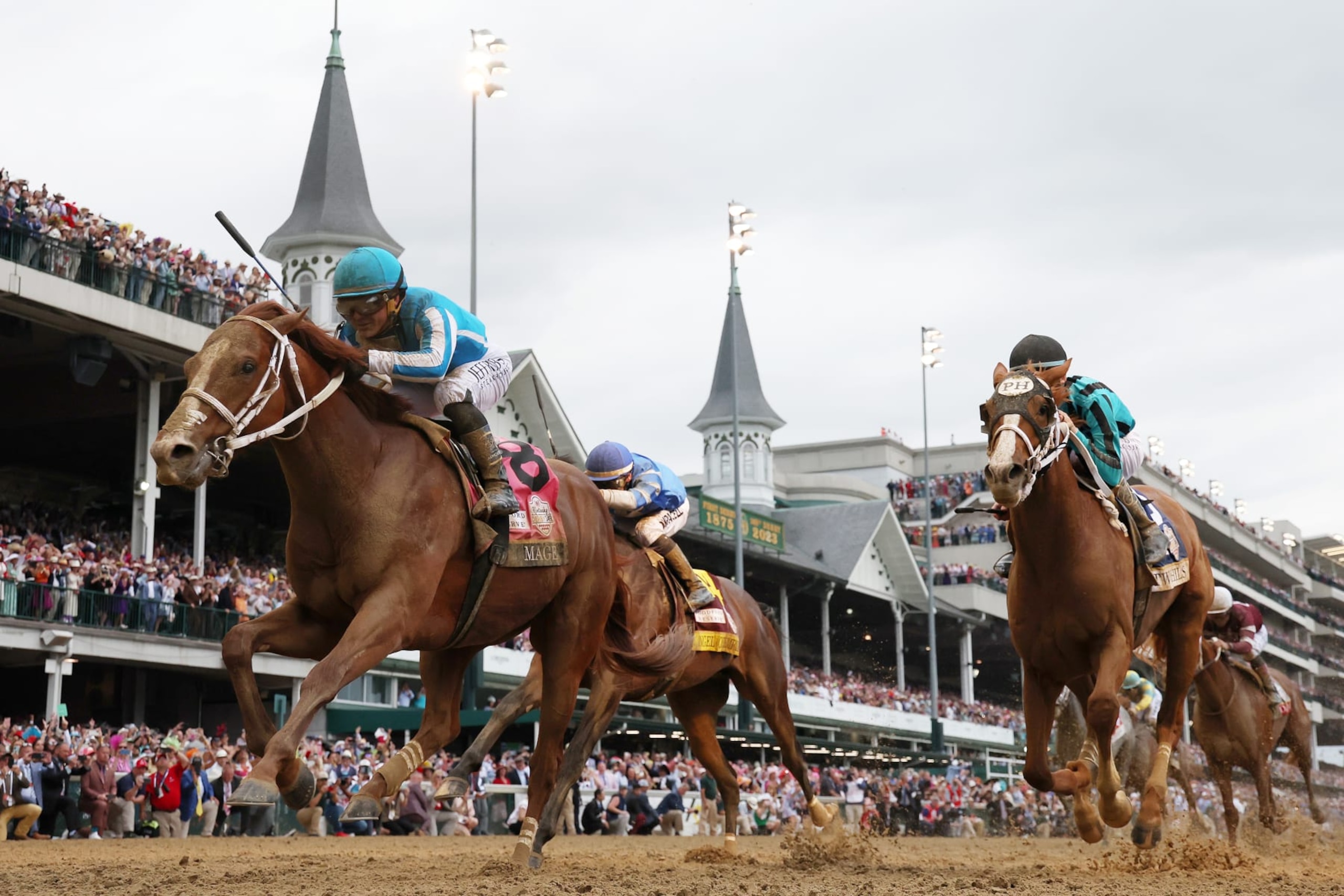 LOUISVILLE, KENTUCKY - MAY 06: Mage #8, ridden by jockey Javier Castellano crosses the finish line to win the 149th running of the Kentucky Derby at Churchill Downs on May 06, 2023 in Louisville, Kentucky. (Photo by Michael Reaves/Getty Images)