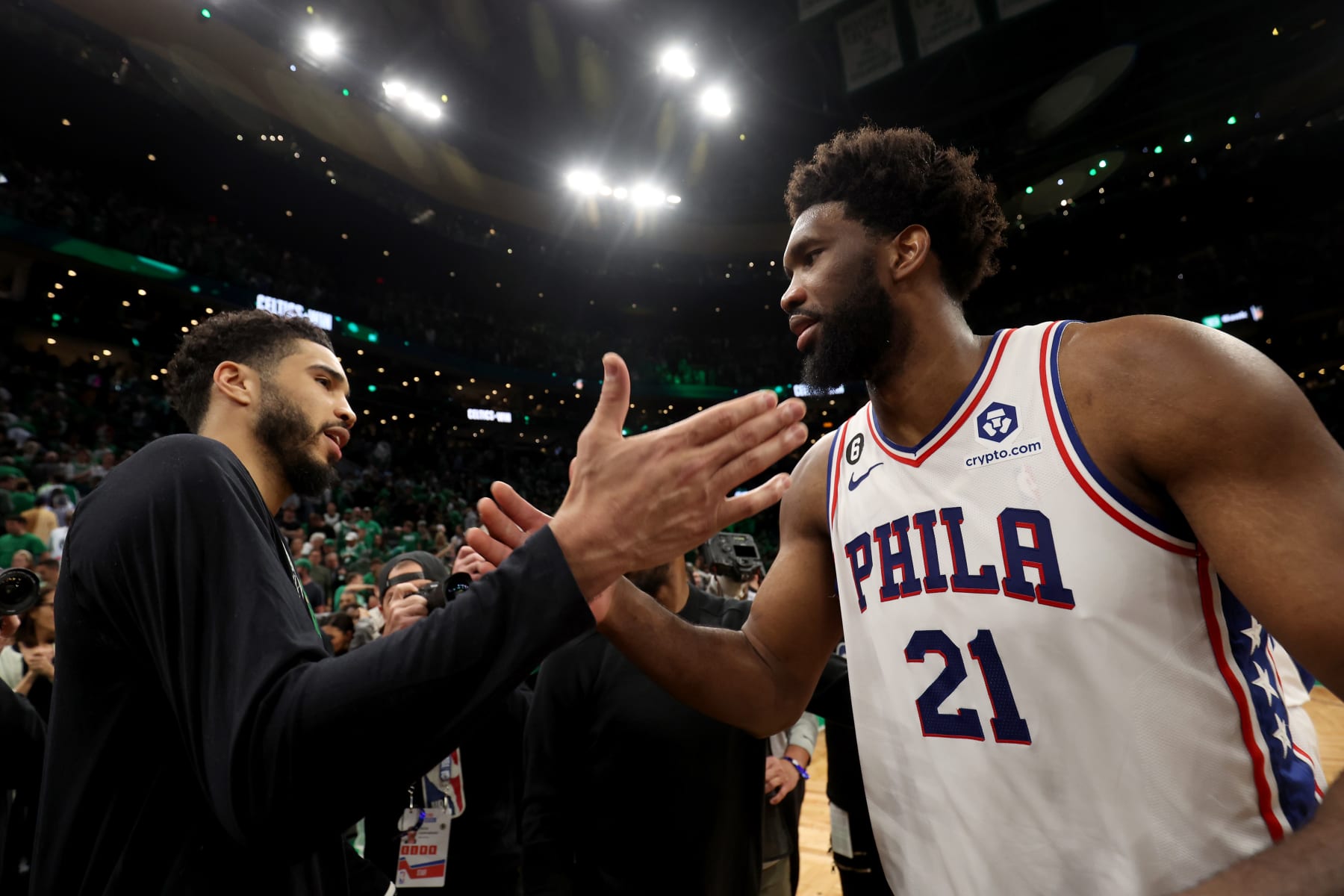 BOSTON, MASSACHUSETTS - MAY 14: (L-R) Jayson Tatum #0 of the Boston Celtics and Joel Embiid #21 of the Philadelphia 76ers shake hands after game seven of the 2023 NBA Playoffs Eastern Conference Semifinals at TD Garden on May 14, 2023 in Boston, Massachusetts. NOTE TO USER: User expressly acknowledges and agrees that, by downloading and or using this photograph, User is consenting to the terms and conditions of the Getty Images License Agreement. (Photo by Adam Glanzman/Getty Images)