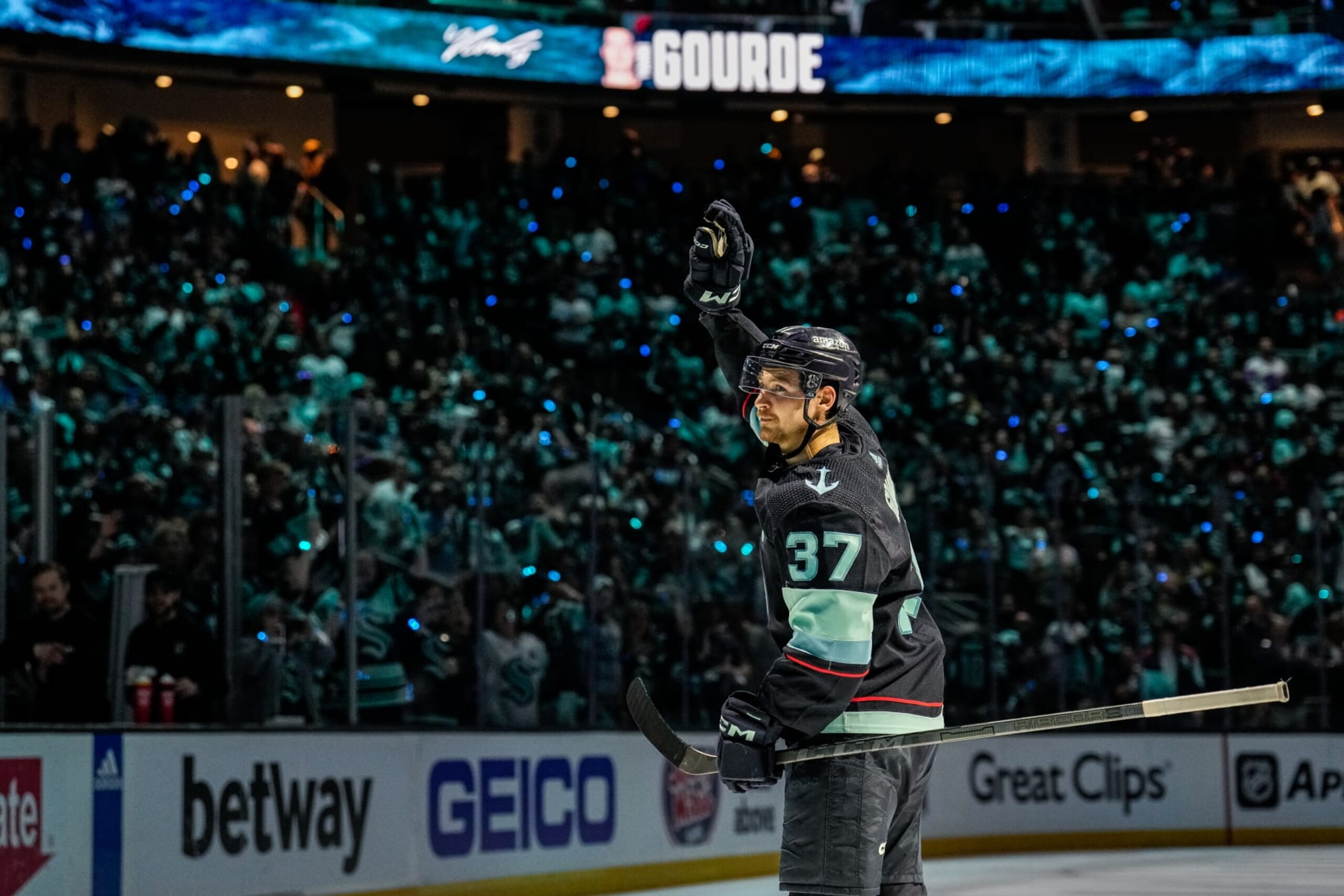SEATTLE, WASHINGTON - MAY 12: Yanni Gourde #37 of the Seattle Kraken waves to the crowd after a victory against the Dallas Stars in Game Six of the Second Round of the 2023 Stanley Cup Playoffs at Climate Pledge Arena on May 12, 2023 in Seattle, Washington. (Photo by Christopher Mast/NHLI via Getty Images)